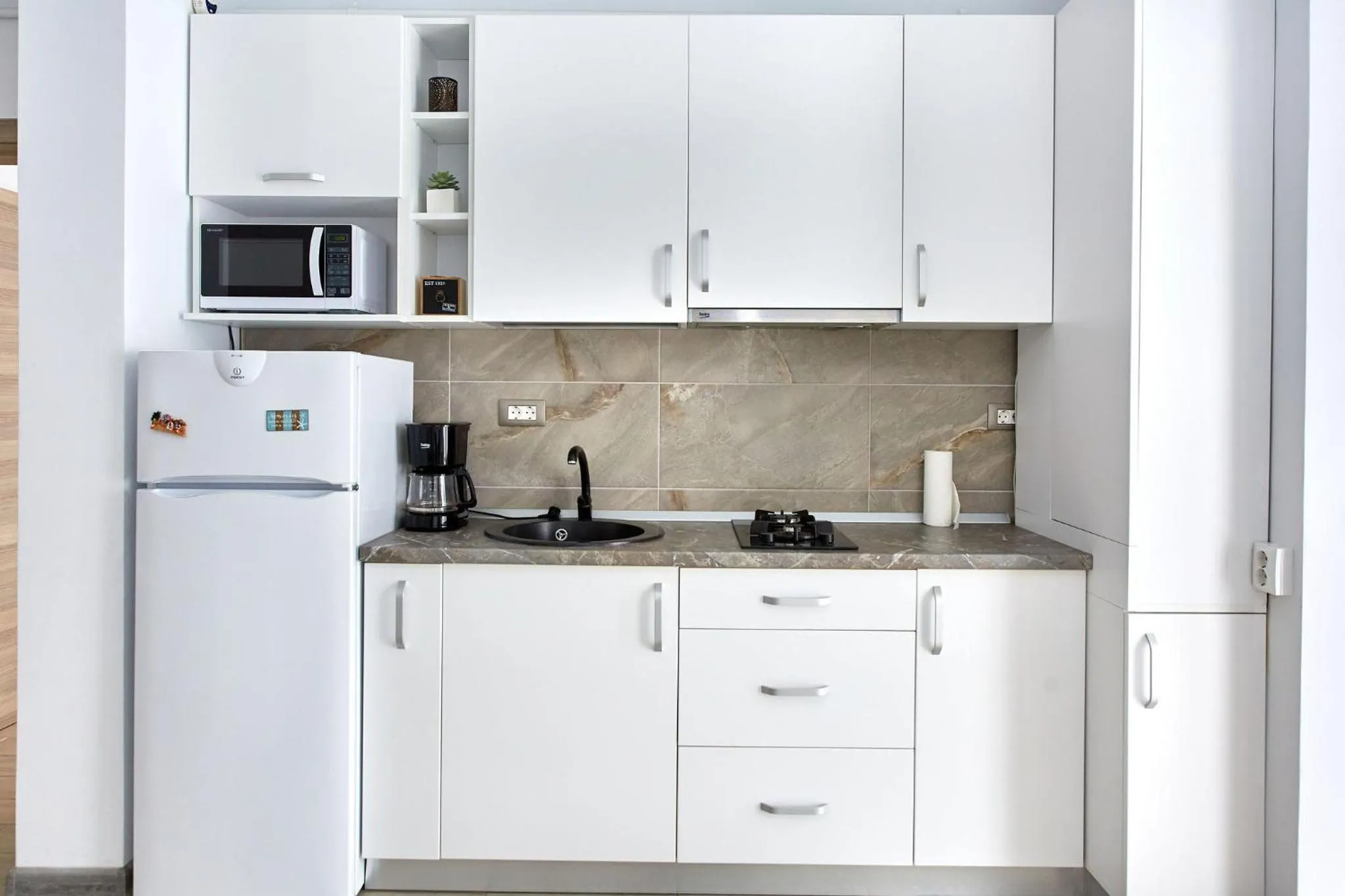 Coffee/tea facilities in Apartamente Indigo by Alz