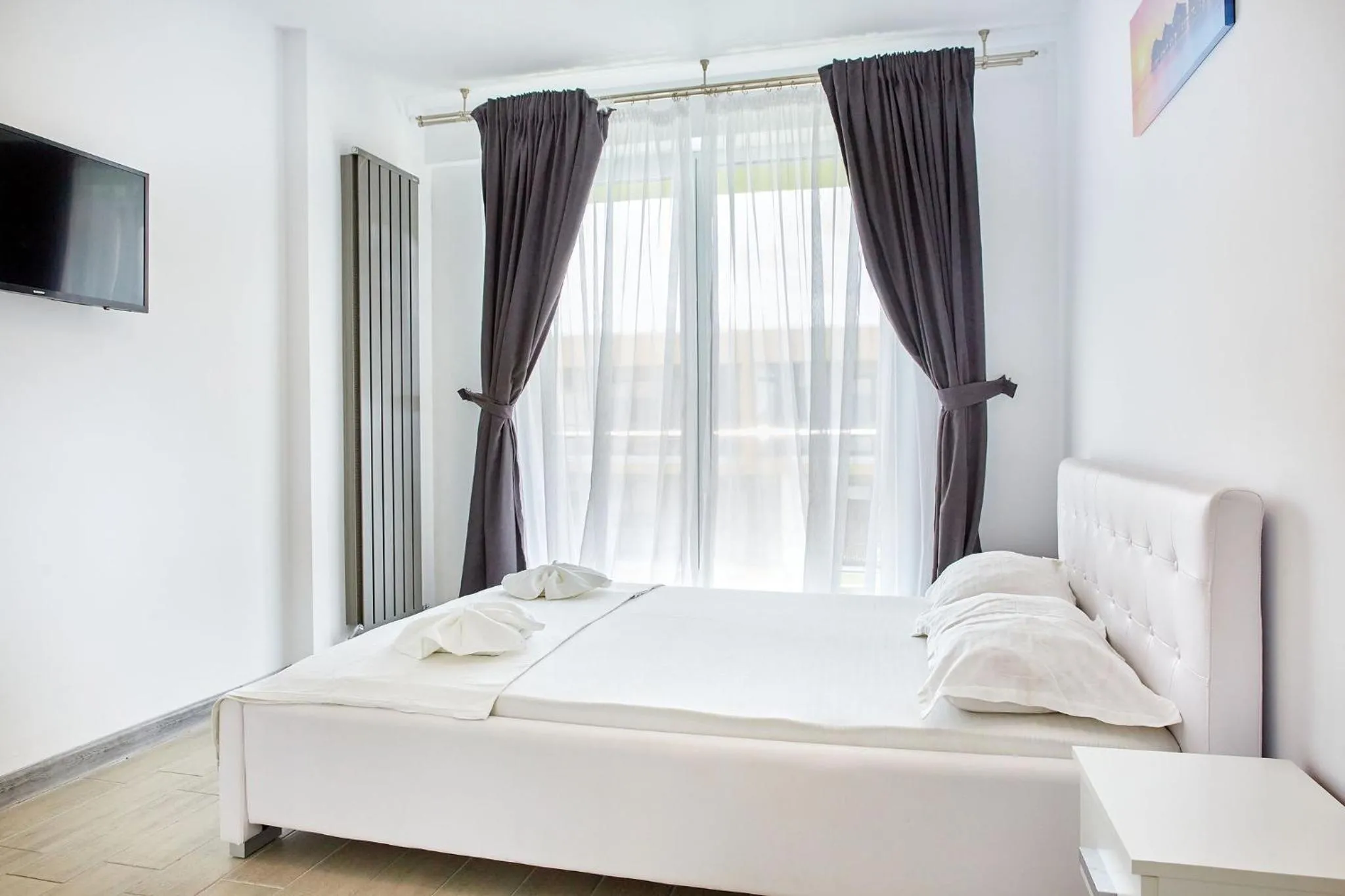 Bed in Apartamente Indigo by Alz