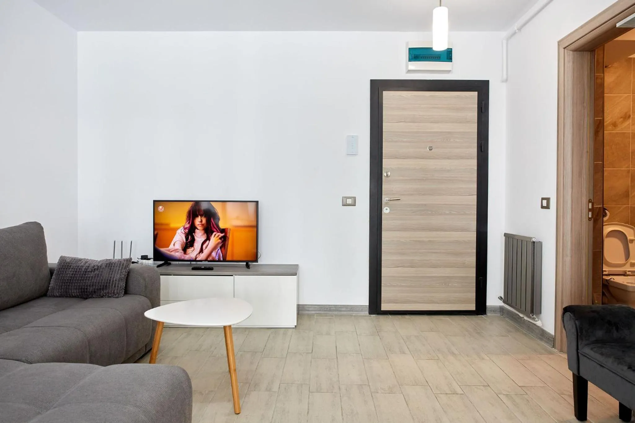 Communal lounge/ TV room in Apartamente Indigo by Alz
