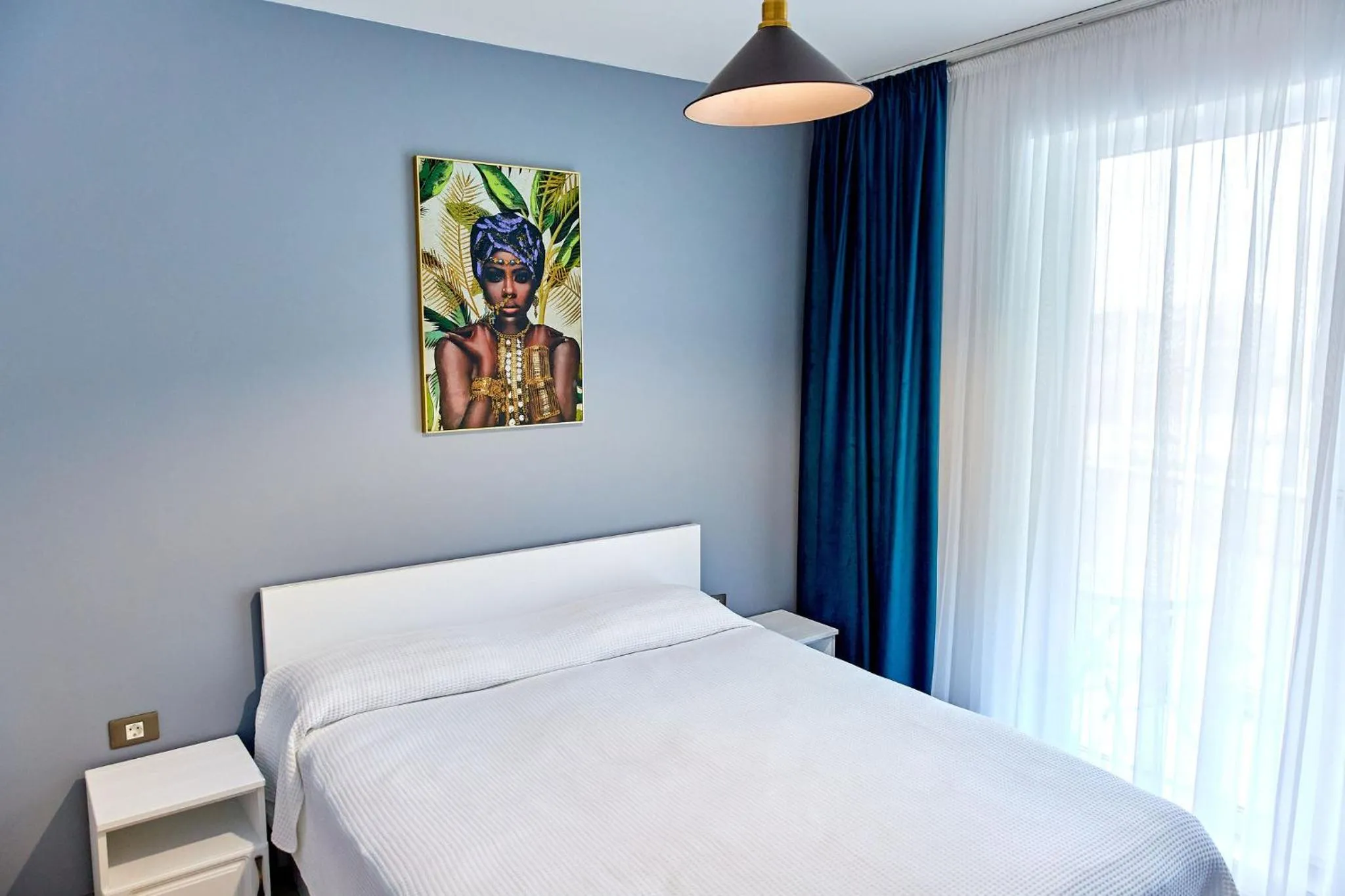 Bed in Apartamente Indigo by Alz