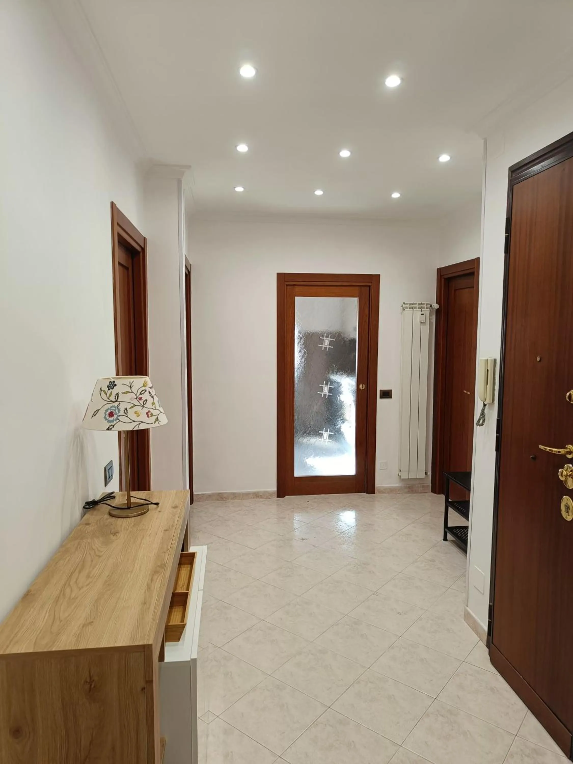 Communal lounge/ TV room in Tia Tourist Apartment Rome