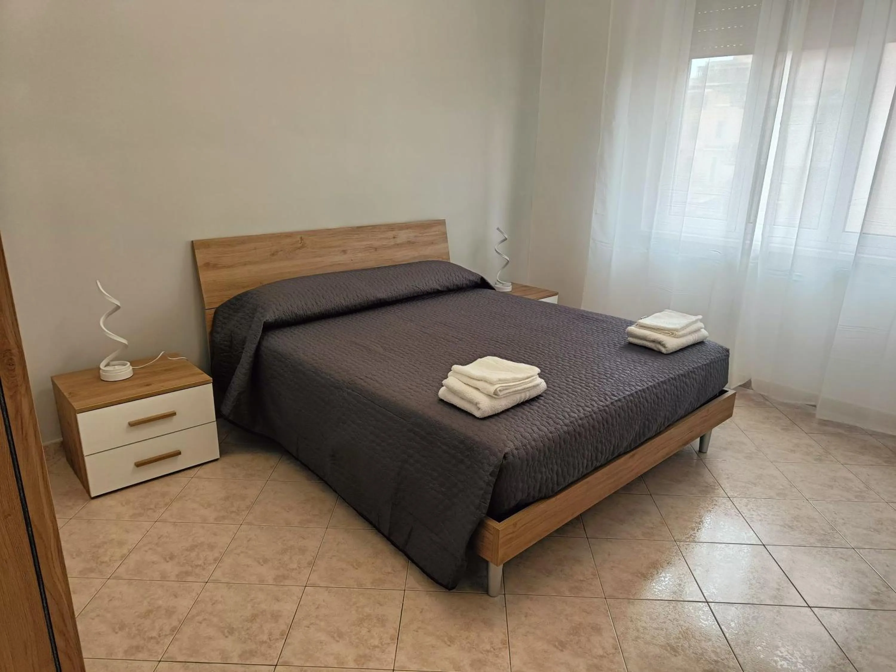 Bedroom, Bed in Tia Tourist Apartment Rome