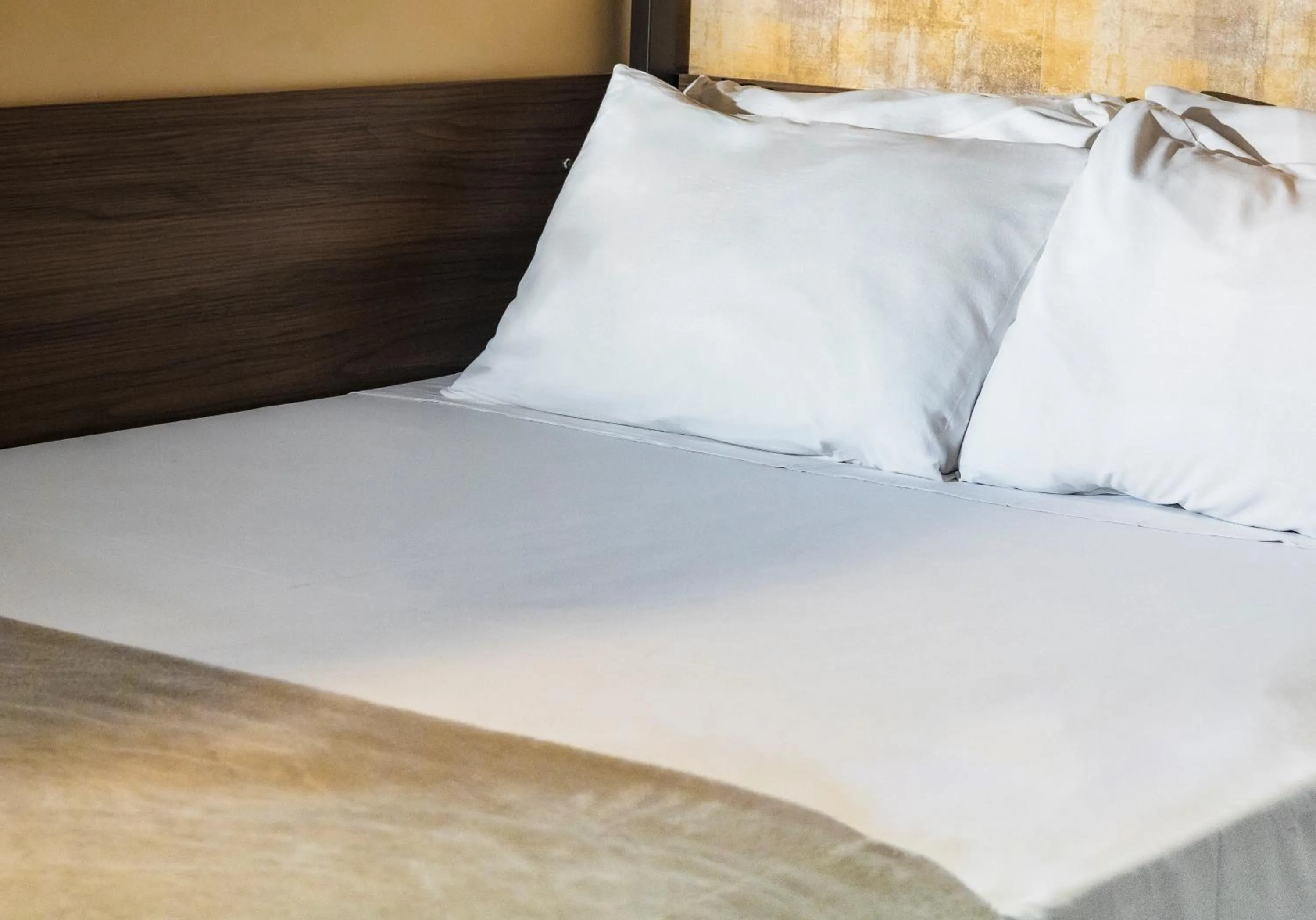 Bed in Uny Hotéis Brás