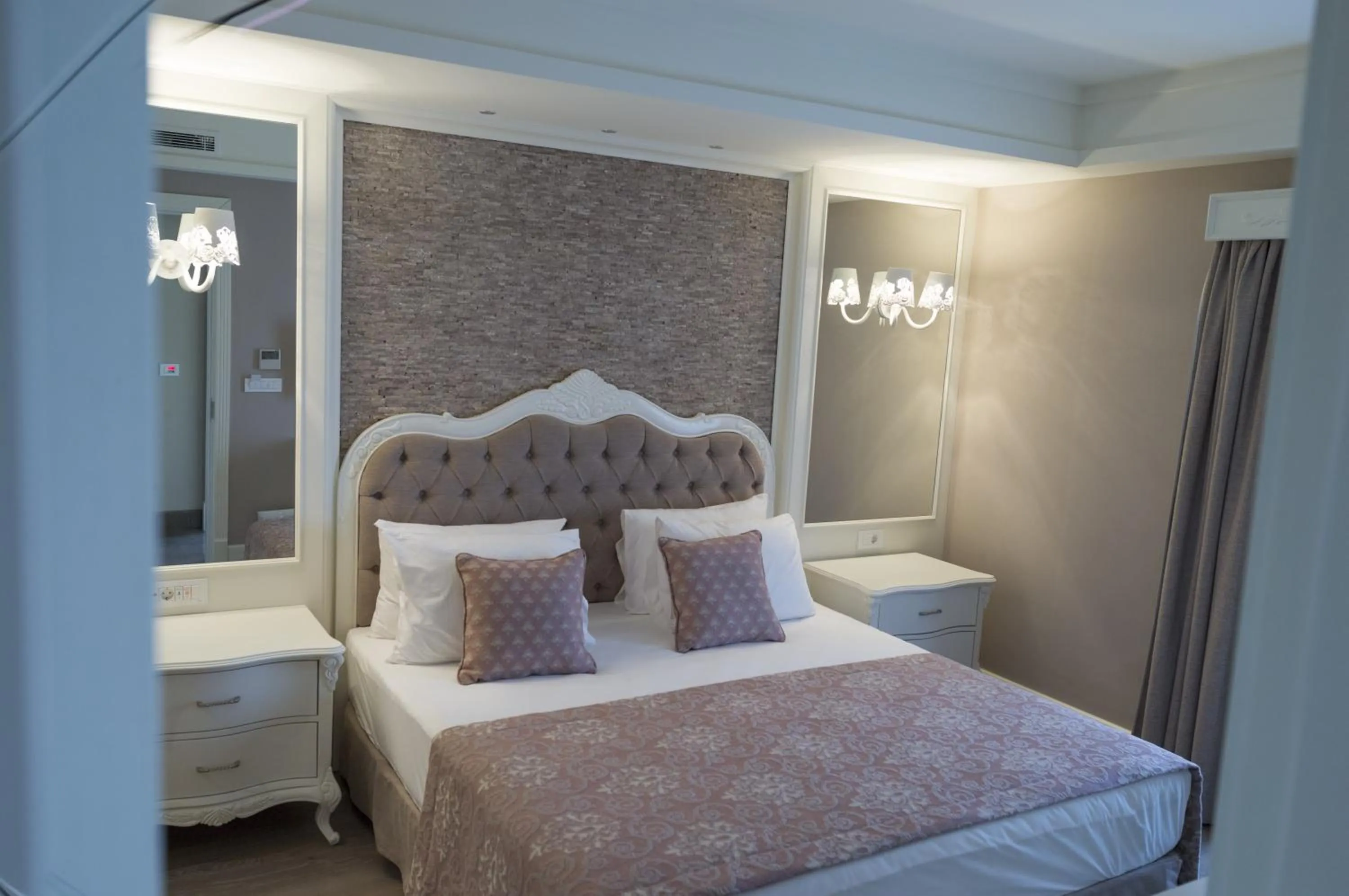 Bed in Ena Boutique Hotel & Residences