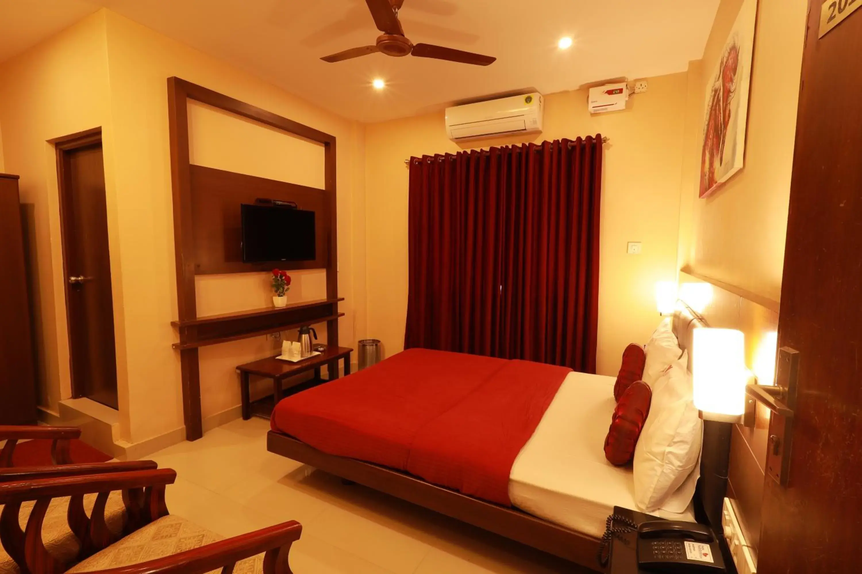 fireplace, Bed in Hotel Nakshatra Inn VL Tuticorin fireplace, Bed in Hotel Nakshatra Inn VL Tuticorin