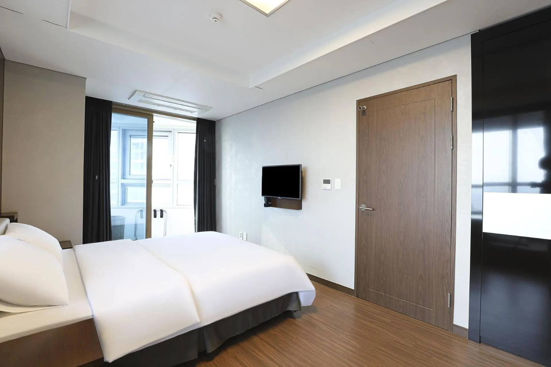 Bed in W Residence Hotel