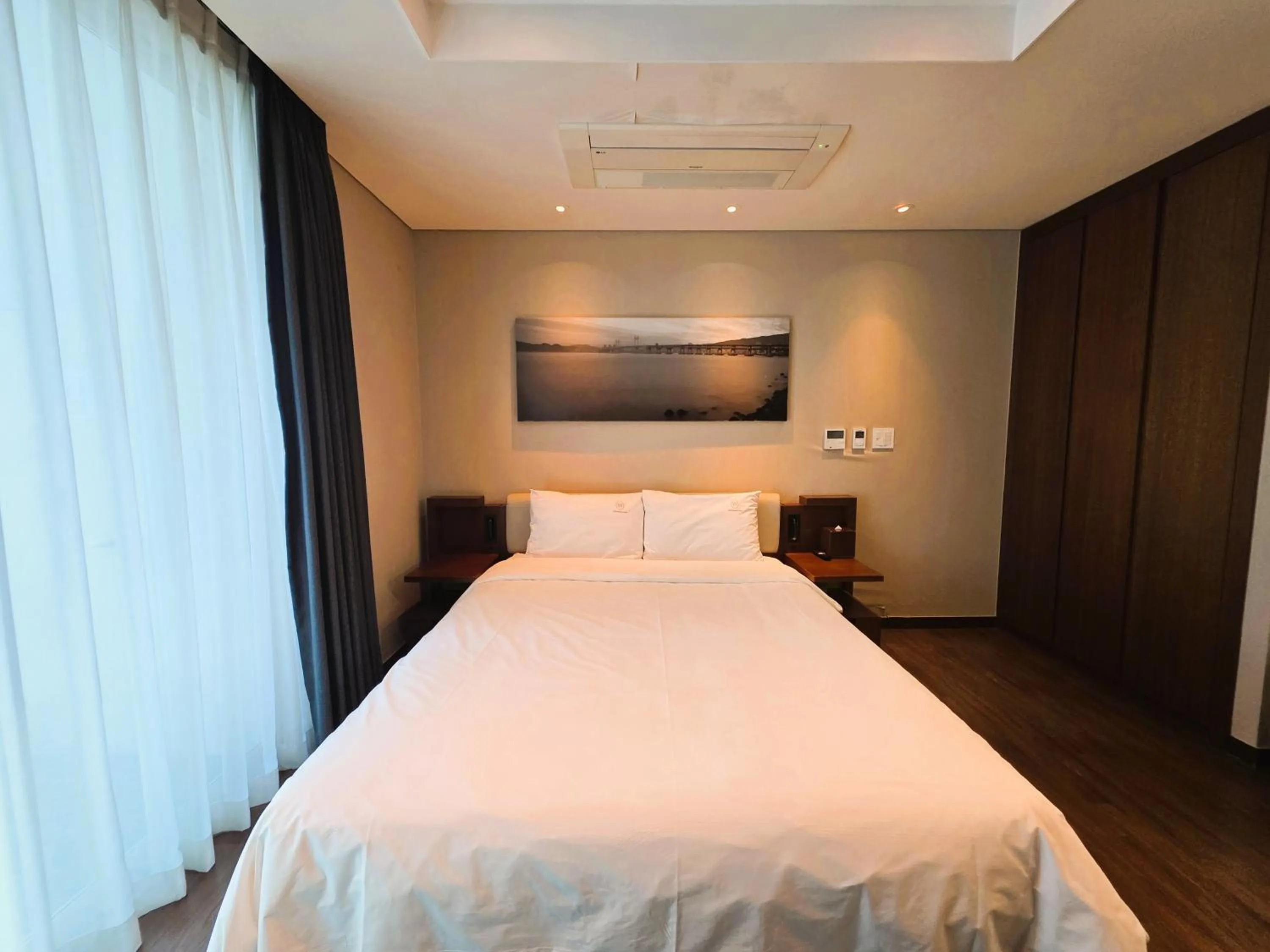 Bed in W Residence Hotel