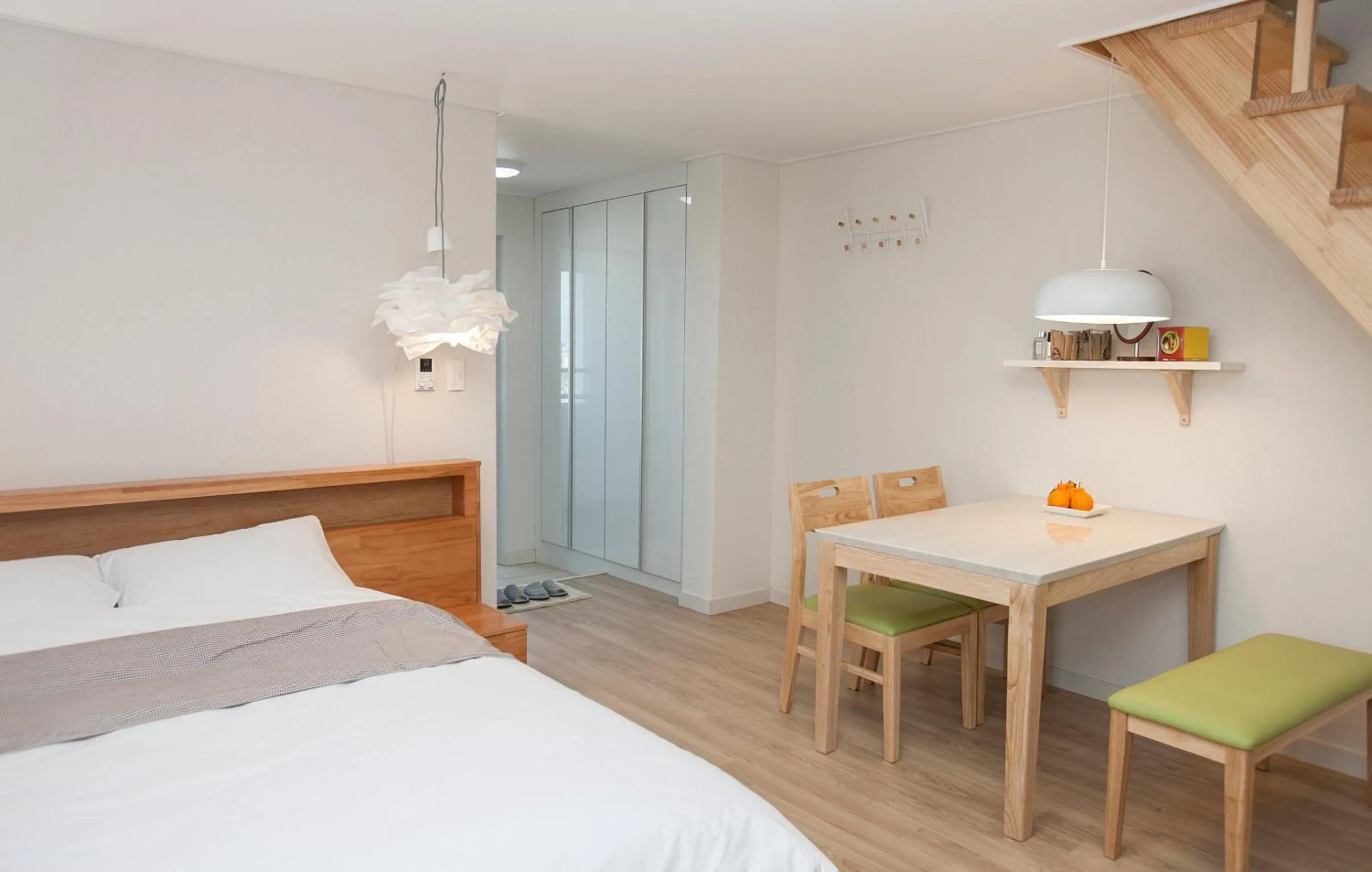 Bed in Jeju Aria Pension