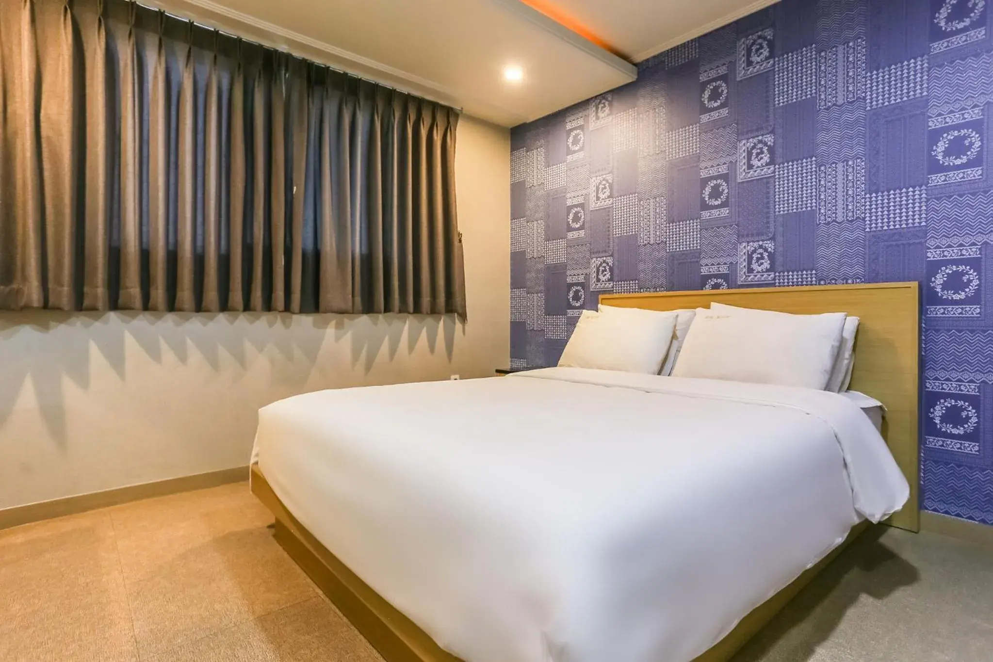 Bed in Aliba Hotel Bed in Aliba Hotel