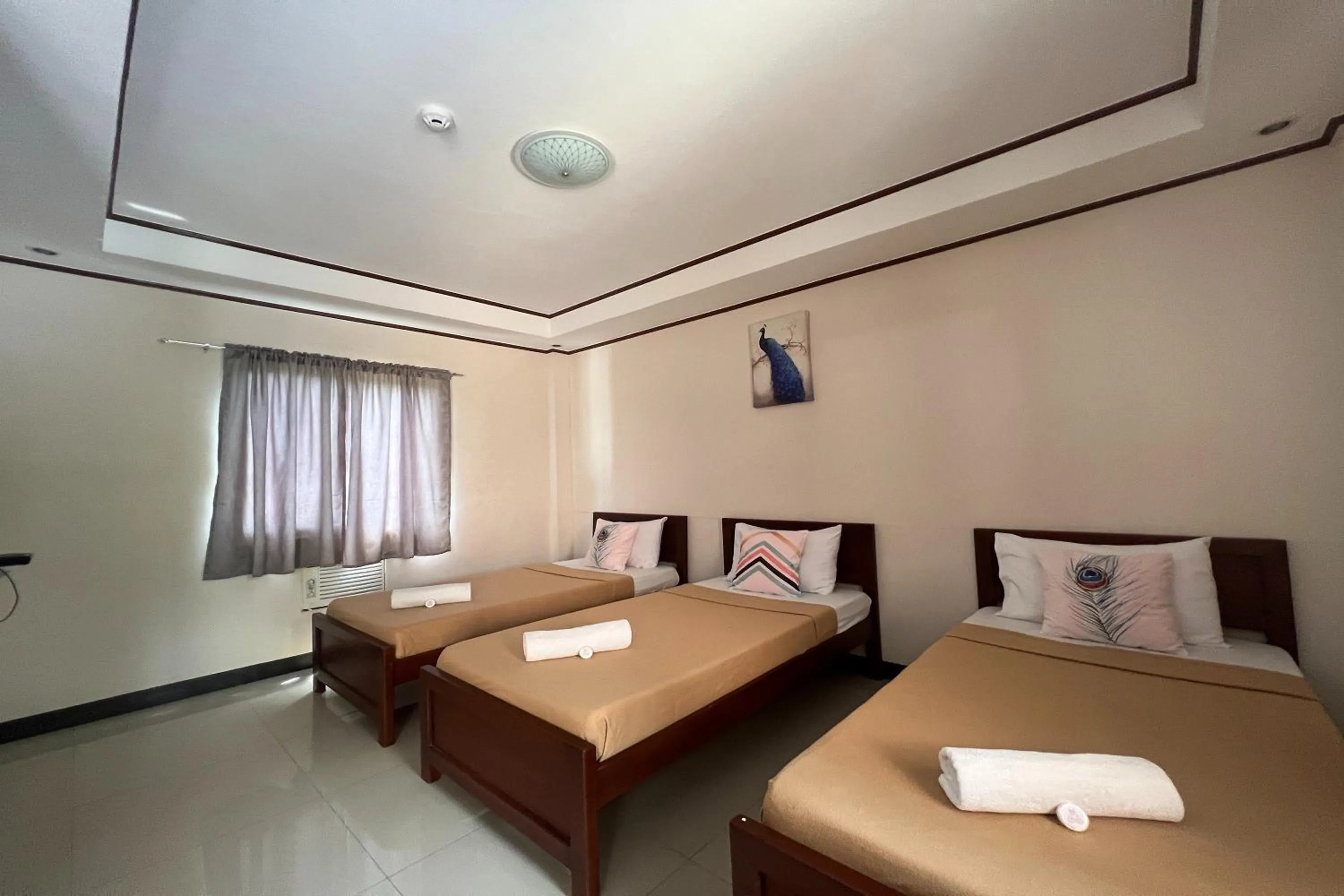 Bedroom, Bed in Dinah's Tourist Inn Puerto Princesa