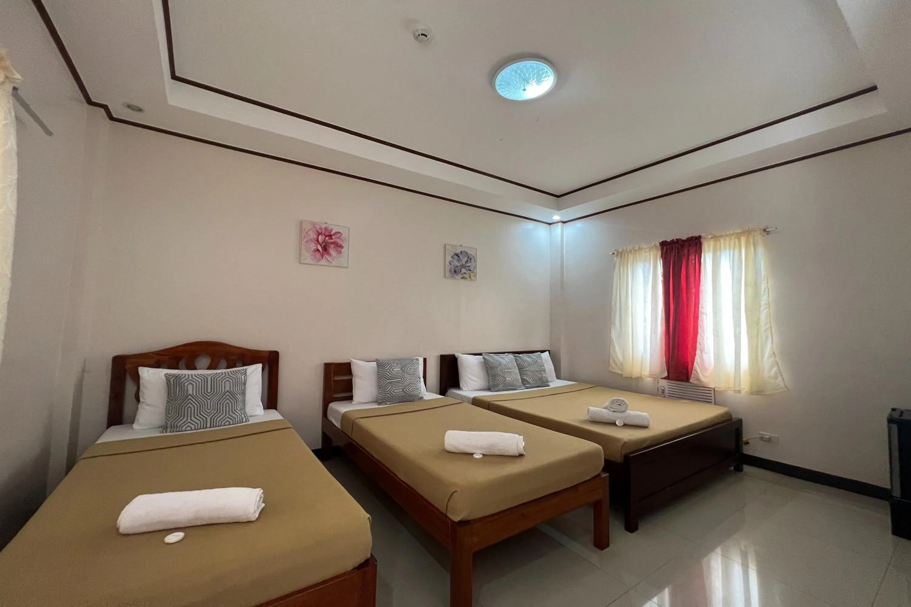 Bedroom, Bed in Dinah's Tourist Inn Puerto Princesa