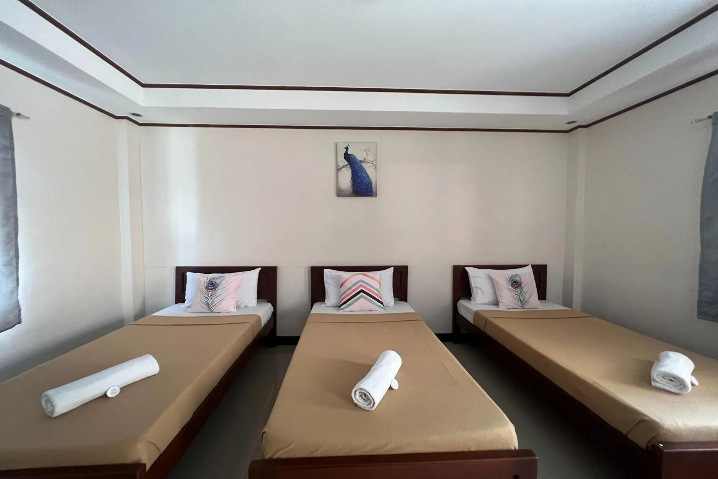 Bedroom, Bed in Dinah's Tourist Inn Puerto Princesa