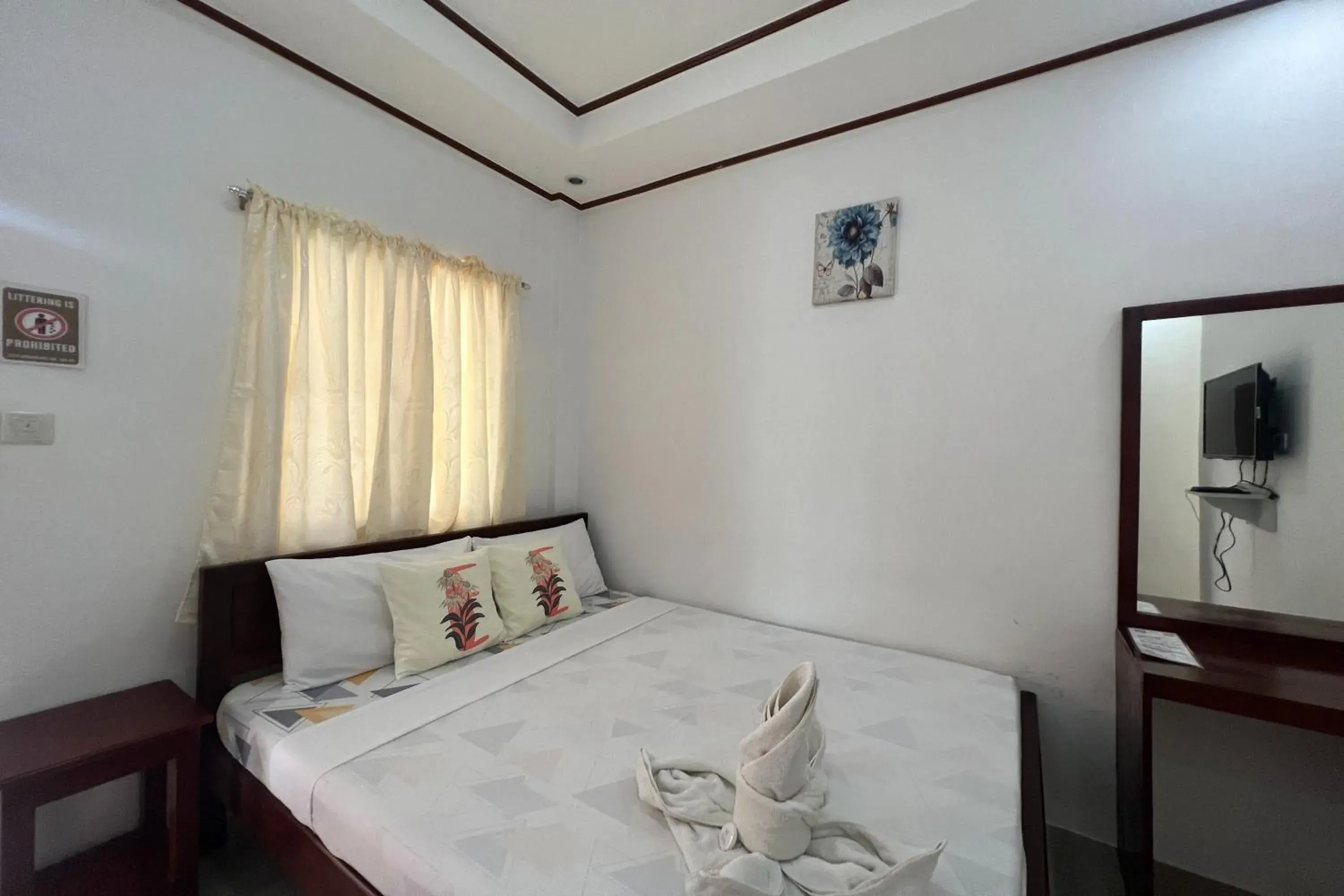 Bedroom, Bed in Dinah's Tourist Inn Puerto Princesa Bedroom, Bed in Dinah's Tourist Inn Puerto Princesa