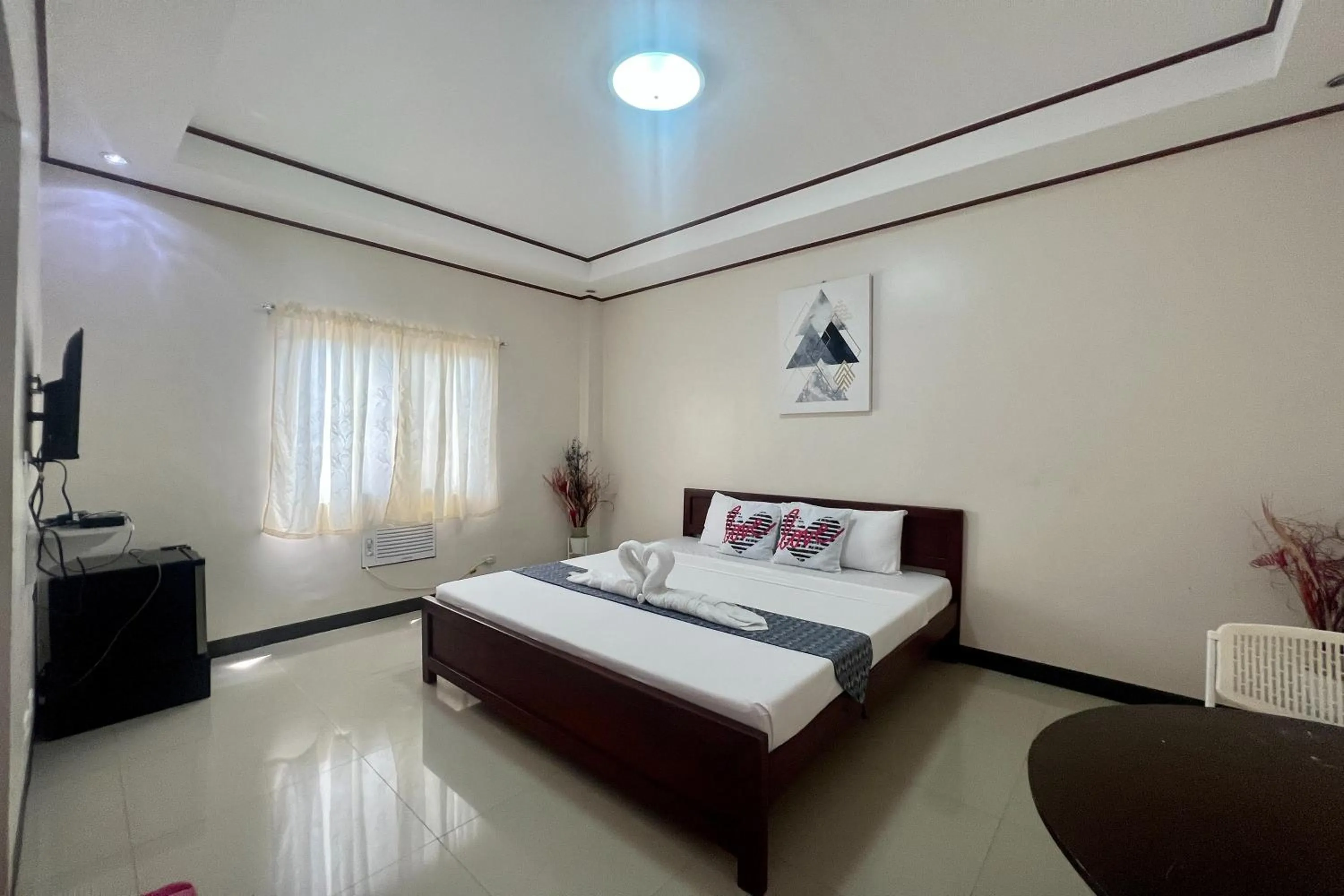 Bedroom, Bed in Dinah's Tourist Inn Puerto Princesa