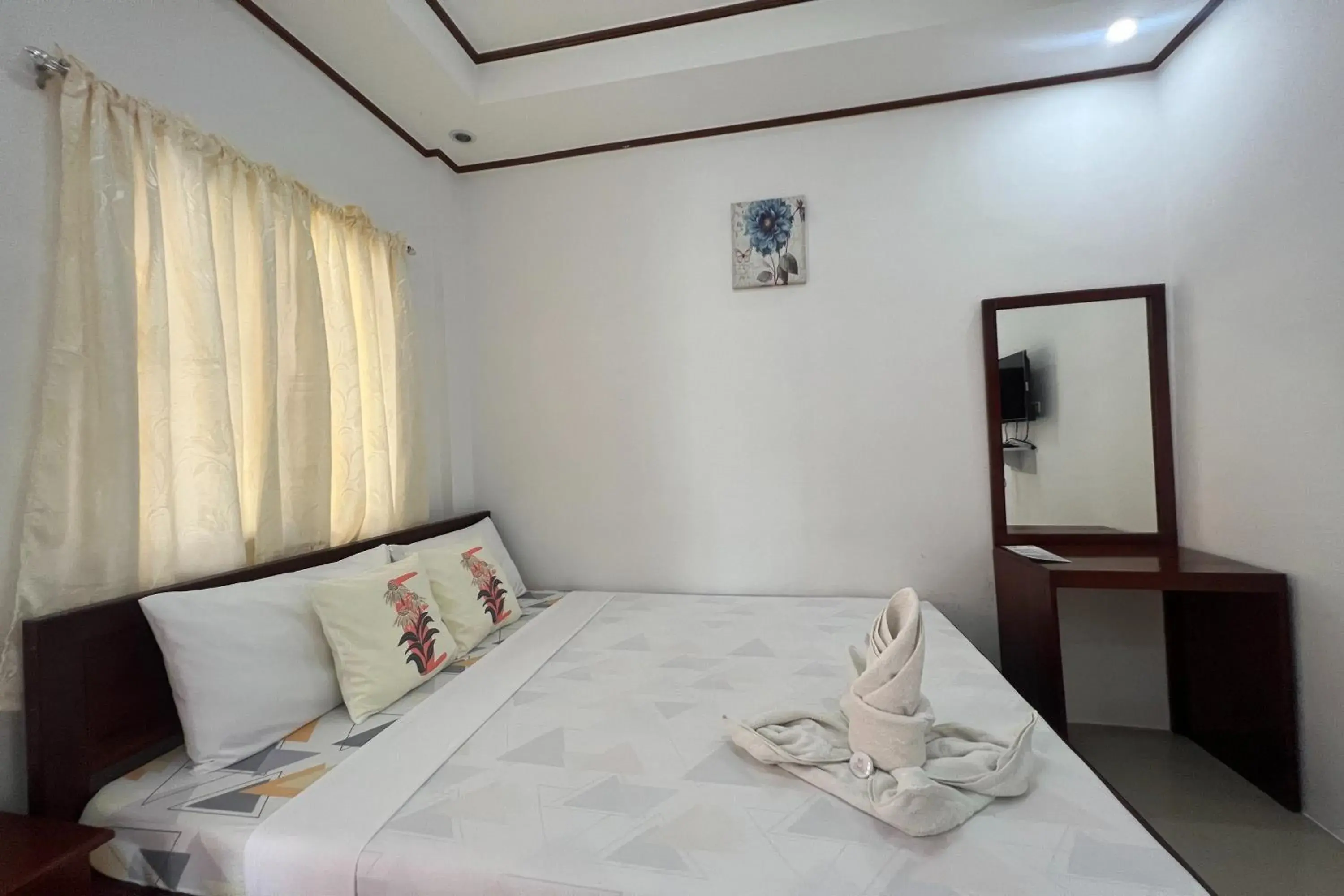 Bedroom, Bed in Dinah's Tourist Inn Puerto Princesa Bedroom, Bed in Dinah's Tourist Inn Puerto Princesa