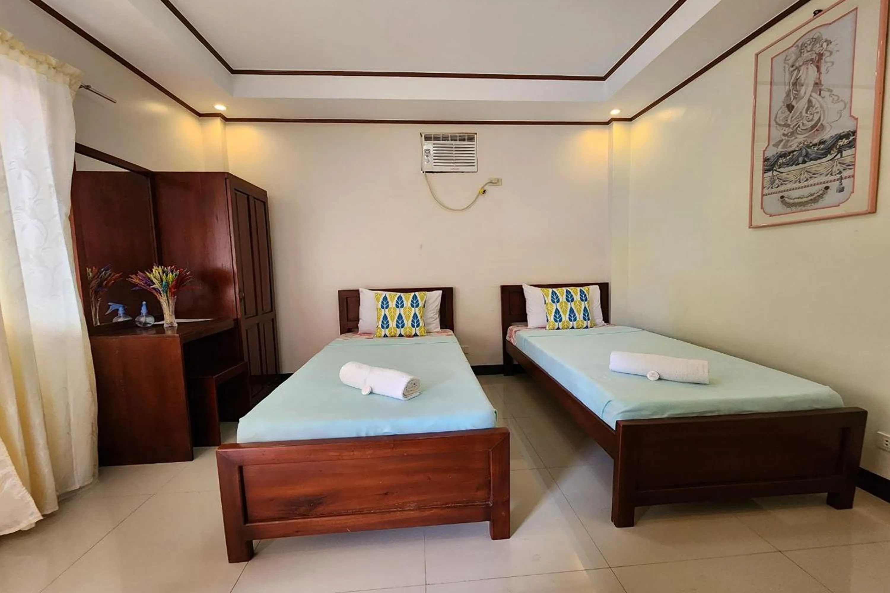 Bed in Dinah's Tourist Inn Puerto Princesa