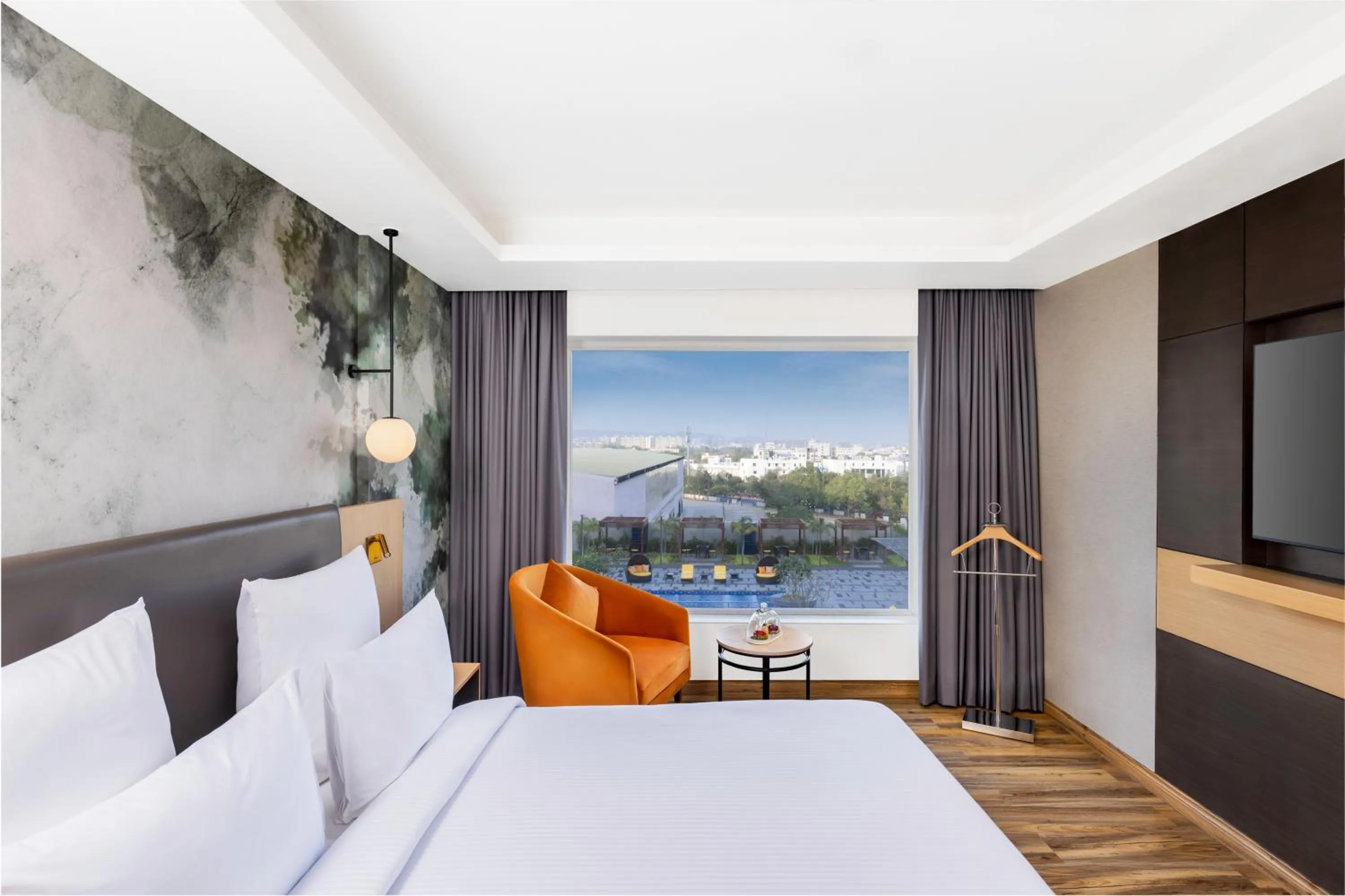 Bed in Novotel Jaipur Convention Centre