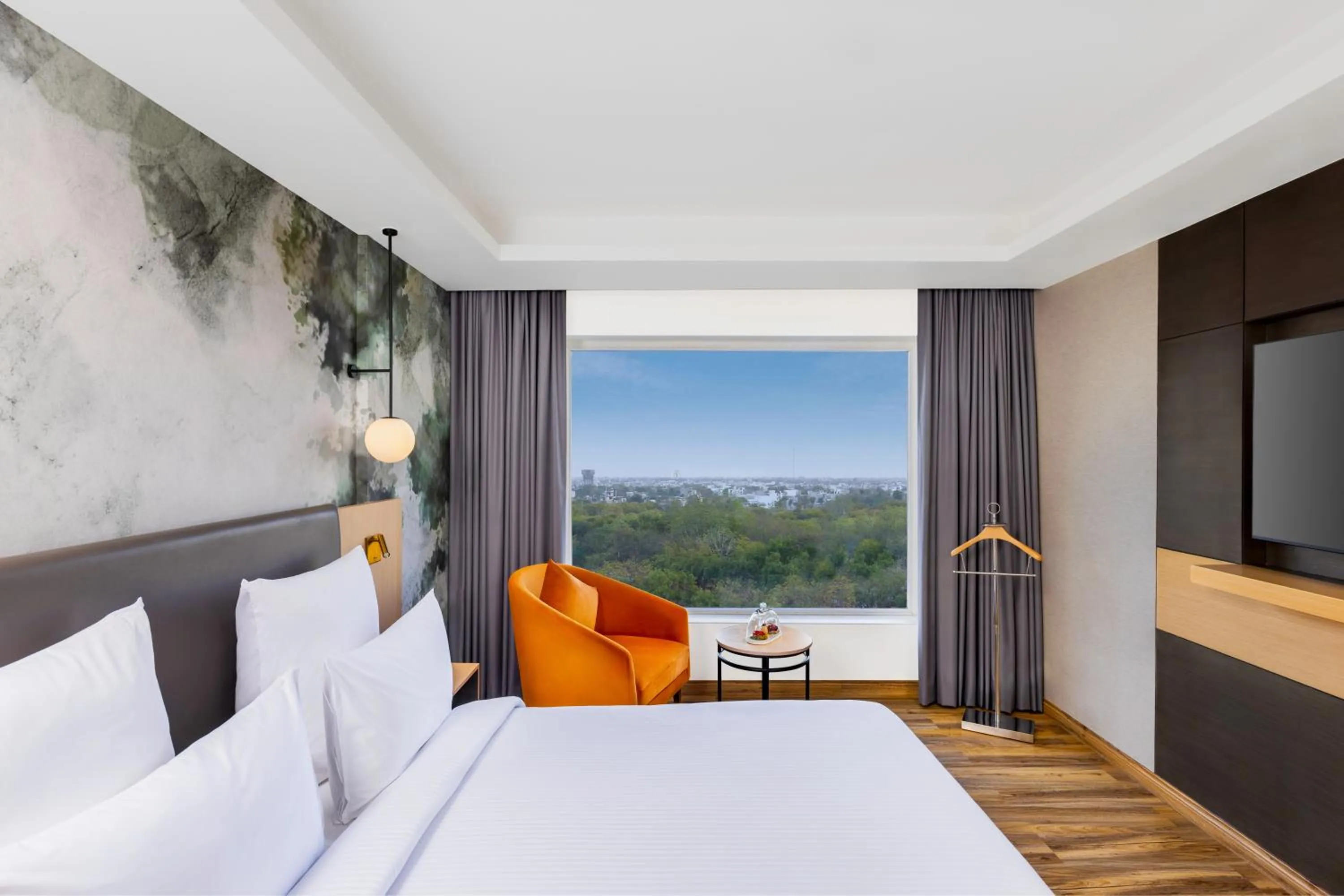 Bed in Novotel Jaipur Convention Centre