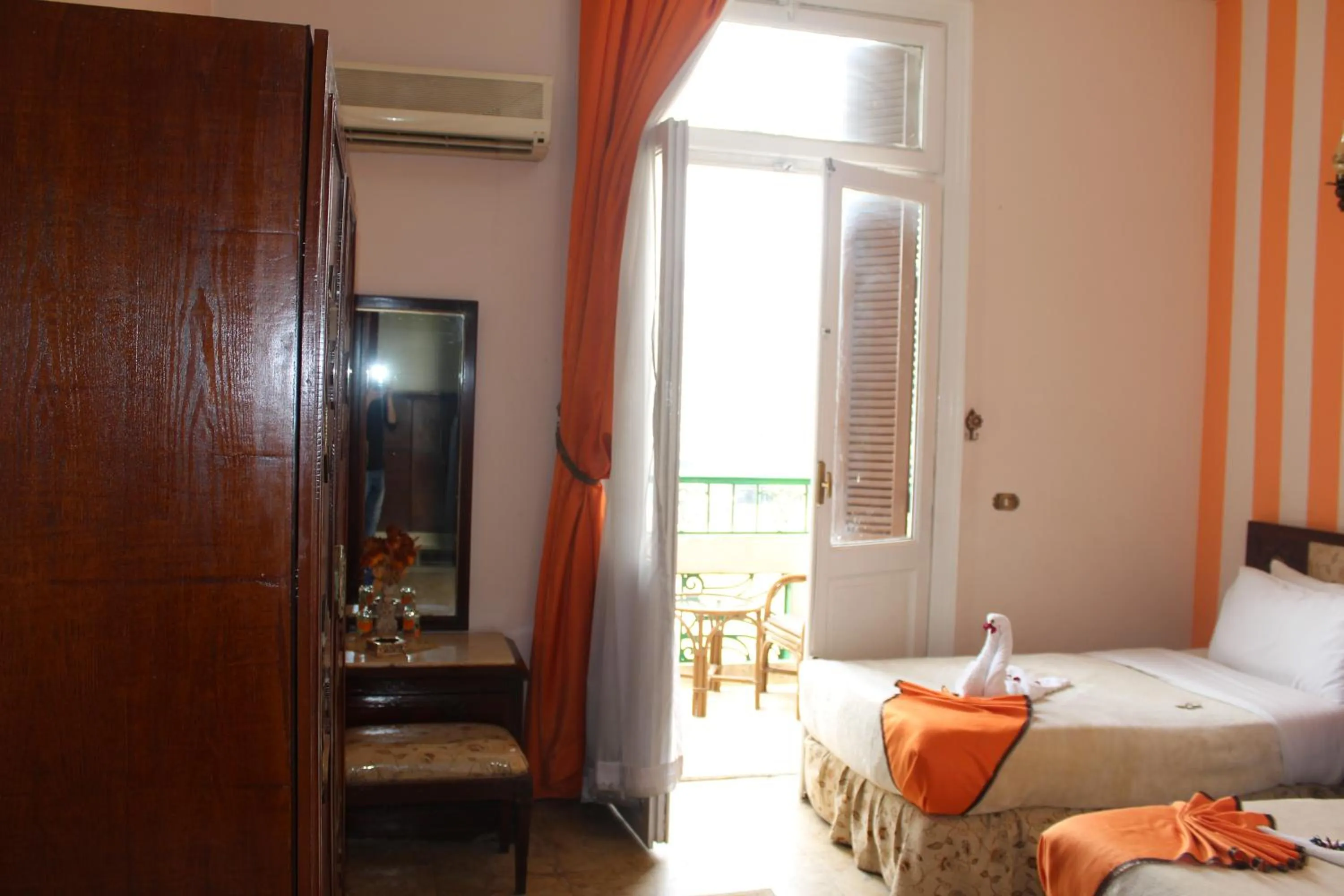 Balcony/Terrace, Bed in City View Museum Hotel