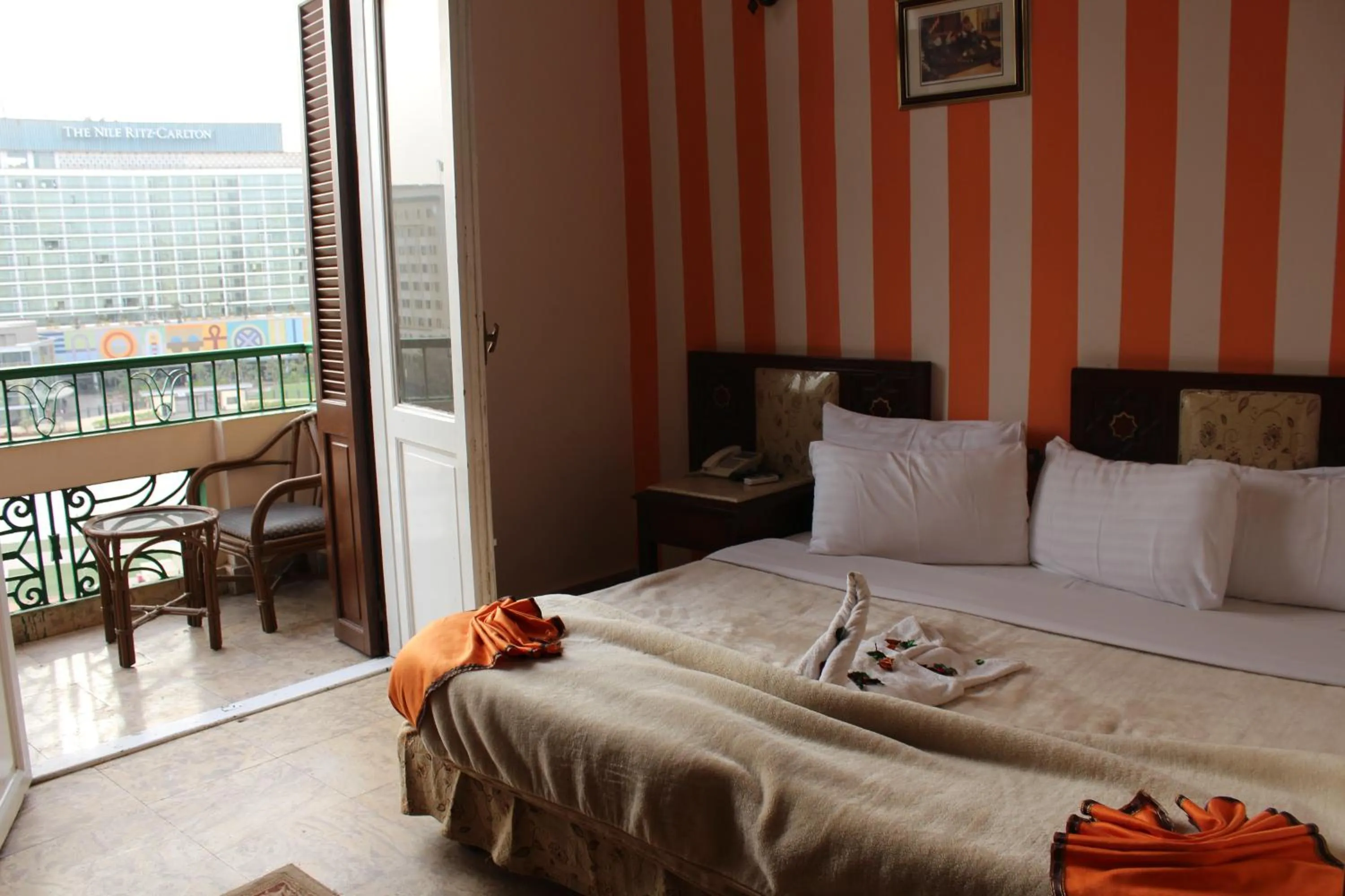 View (from property/room), Bed in City View Museum Hotel