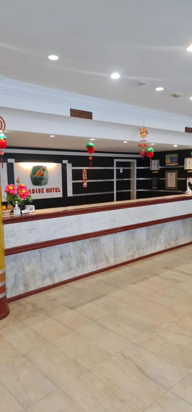 Lobby or reception in Paradise Hotel