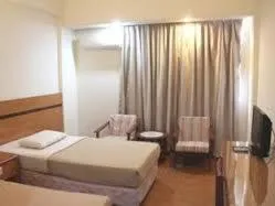 Bedroom in Paradise Hotel