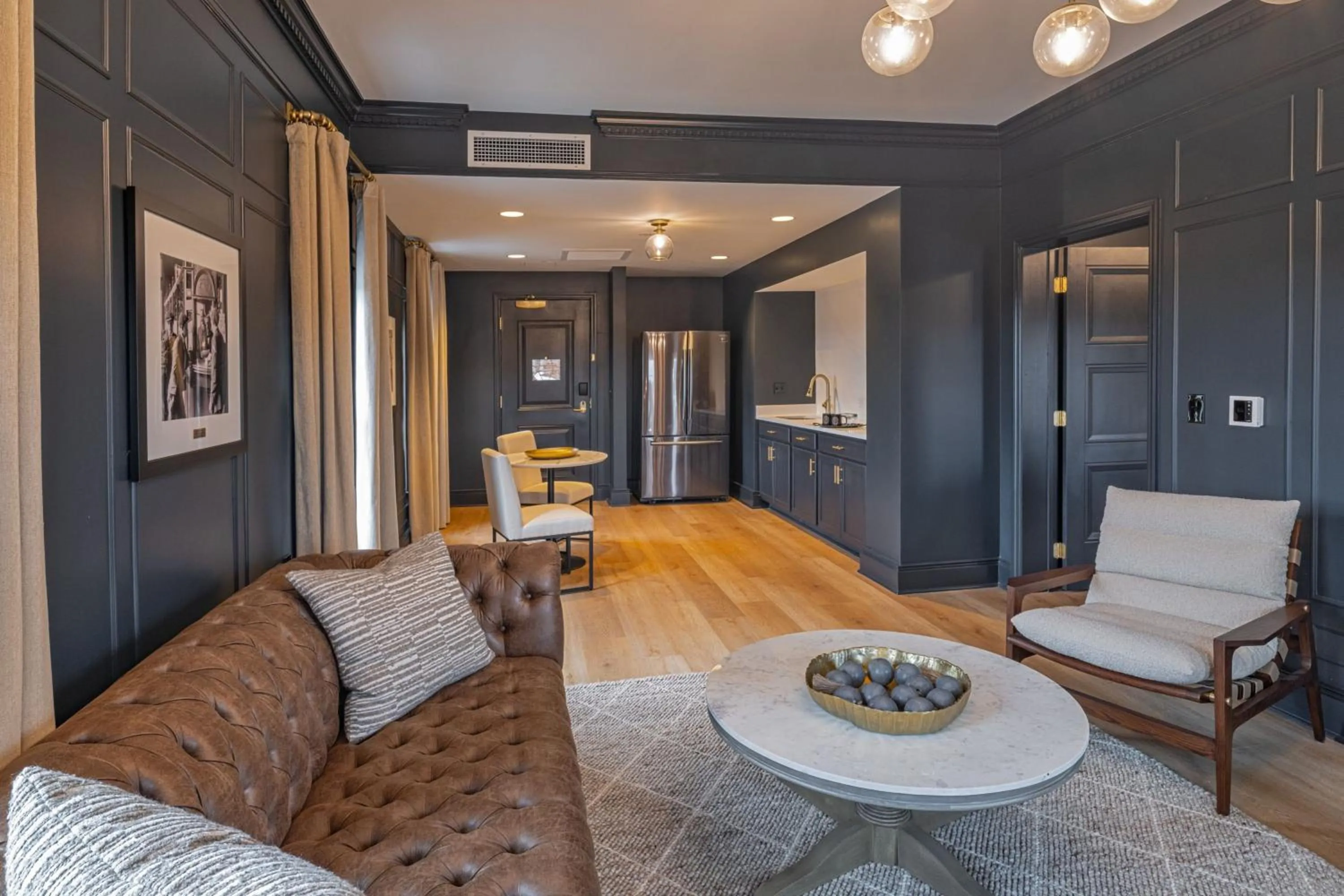 Living room in The Publisher, Downtown Fredericksburg, a Tribute Portfolio Hotel