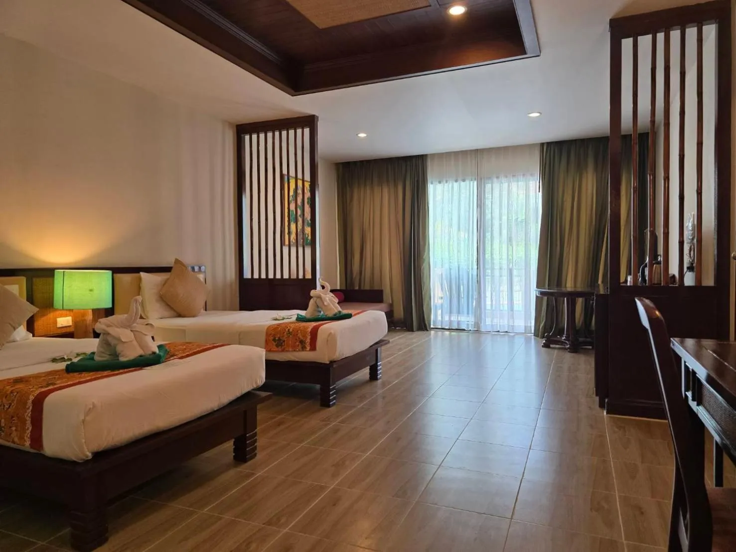 Bed in Hotel and Beach Bungalow at Lanta Resort