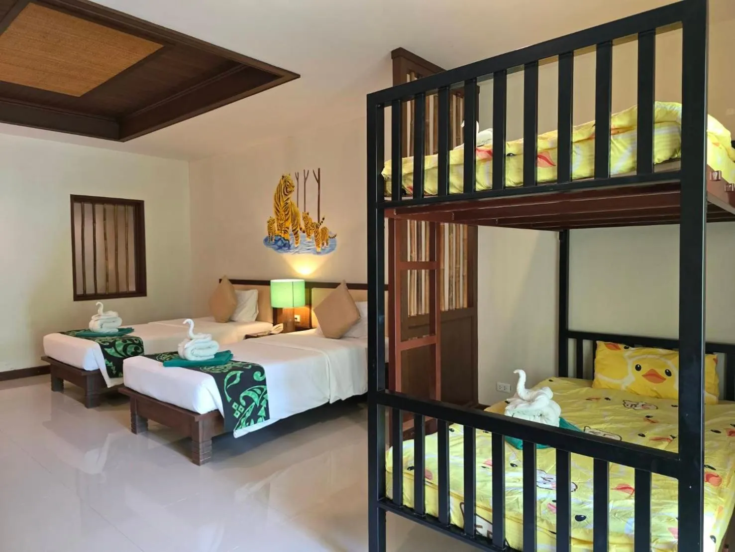 Bed in Hotel and Beach Bungalow at Lanta Resort