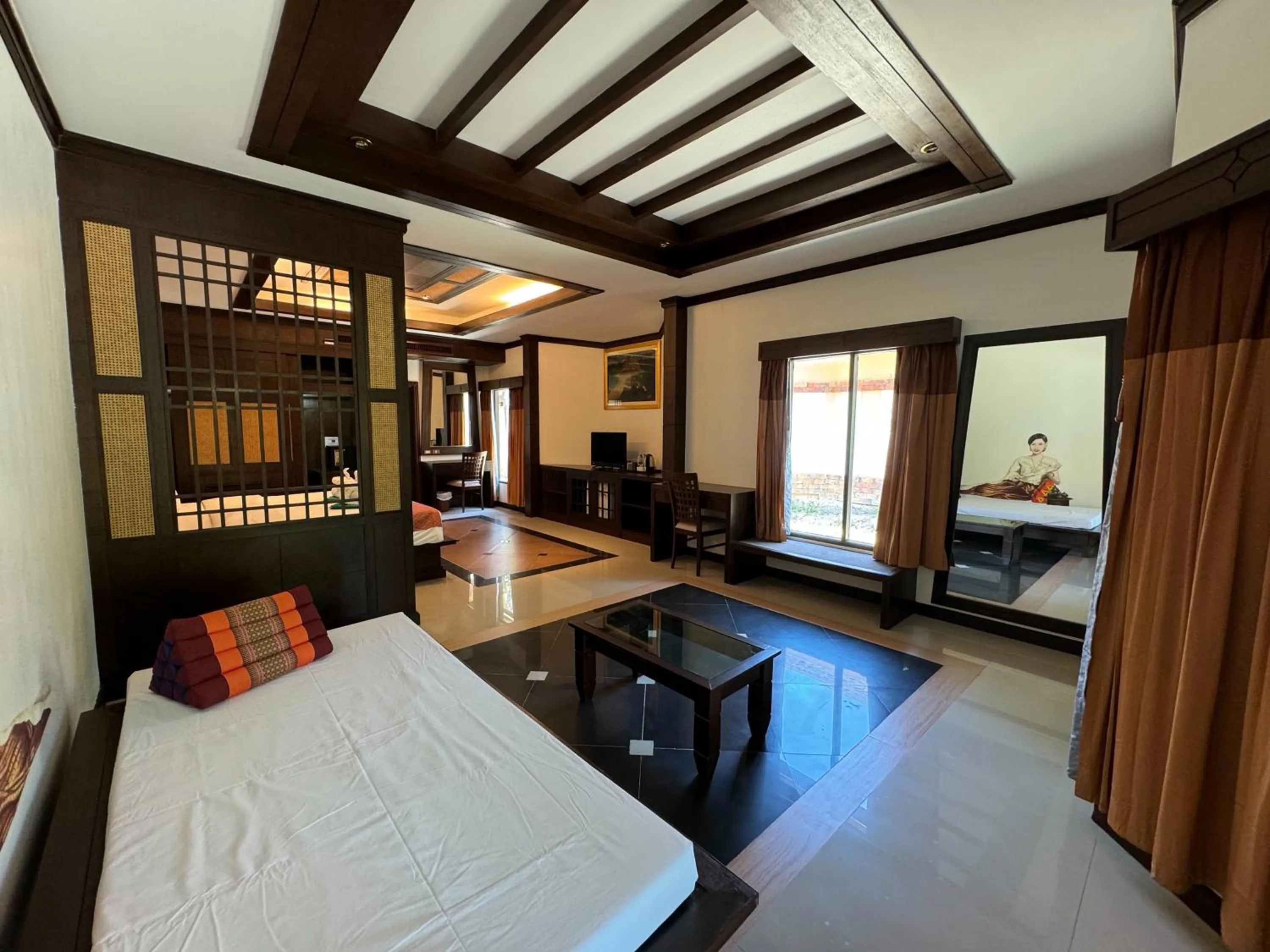 Bed in Hotel and Beach Bungalow at Lanta Resort