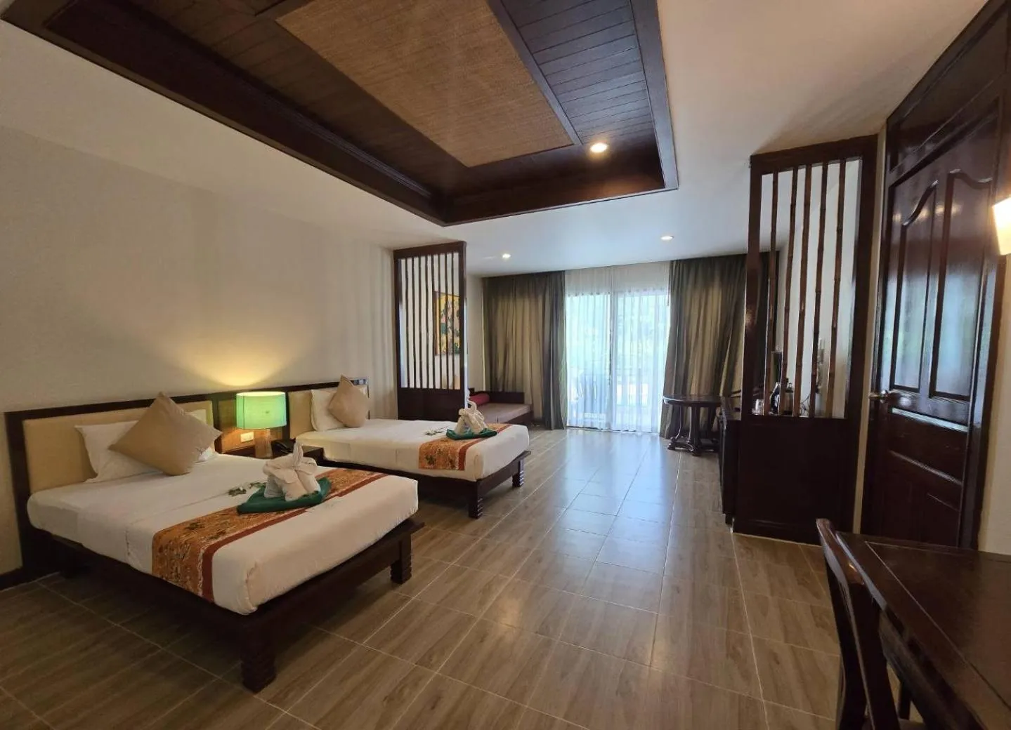 Bed in Hotel and Beach Bungalow at Lanta Resort