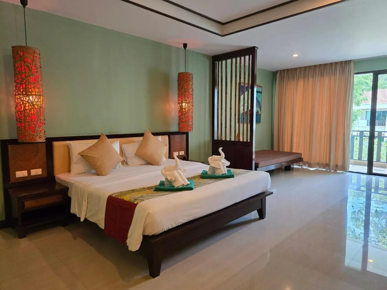Bed in Hotel and Beach Bungalow at Lanta Resort