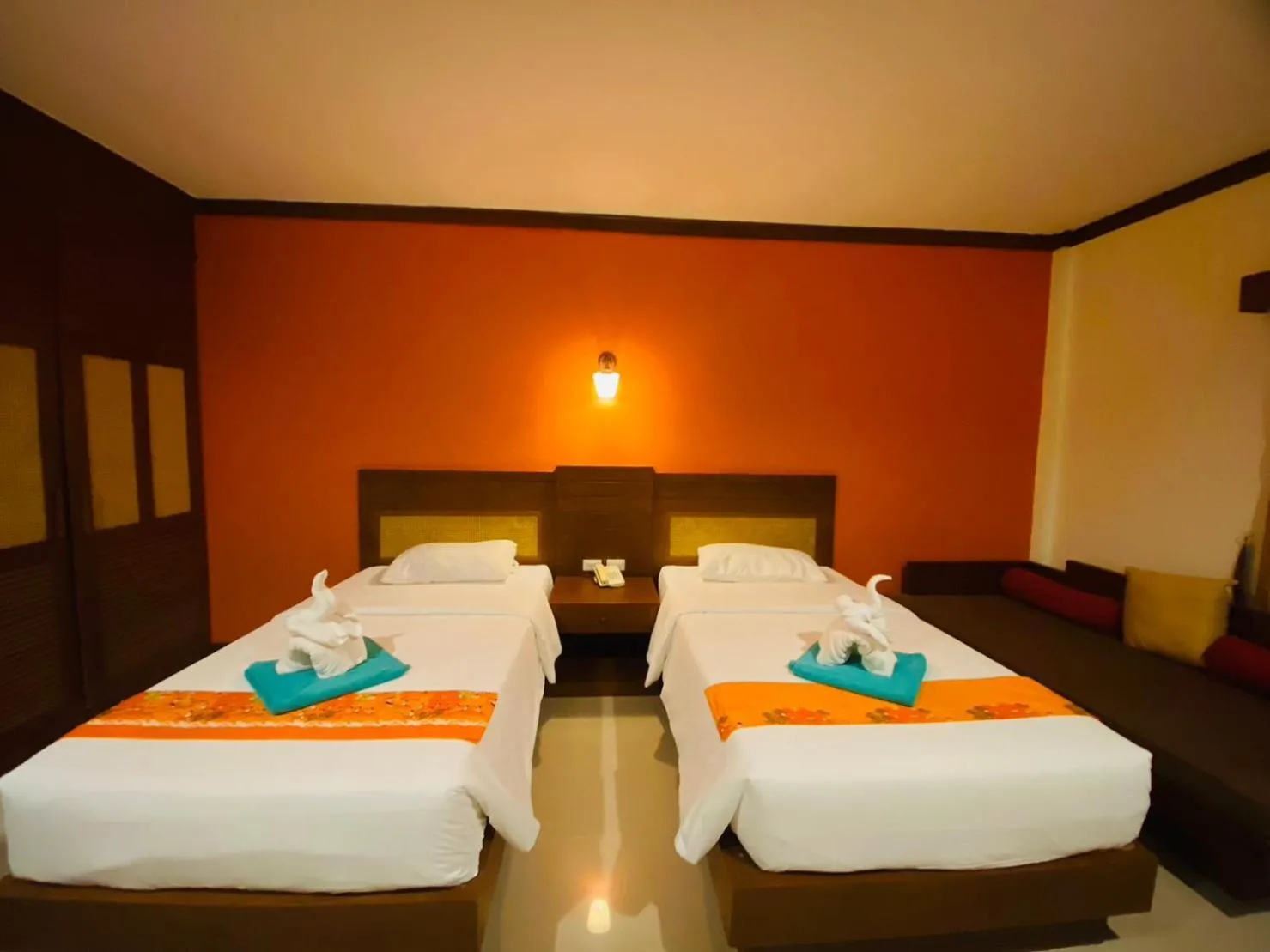 Bed in Hotel and Beach Bungalow at Lanta Resort