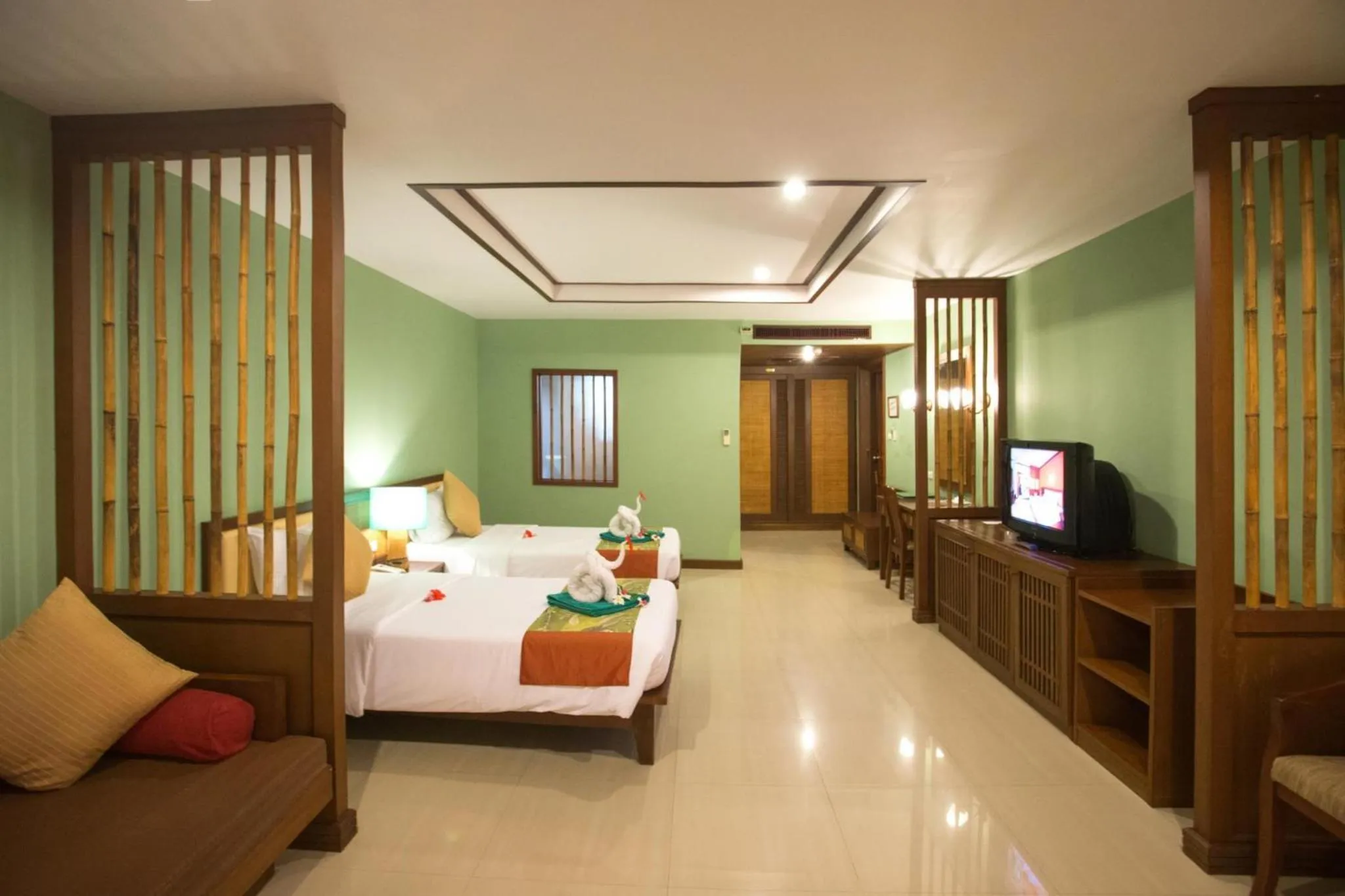 Photo of the whole room, Bed in Hotel and Beach Bungalow at Lanta Resort