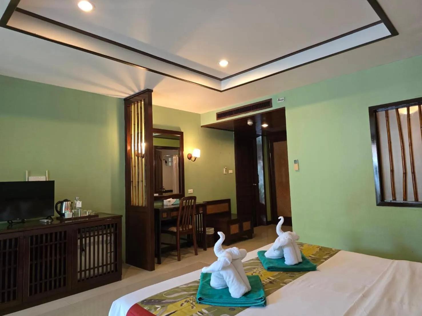 Bed in Hotel and Beach Bungalow at Lanta Resort