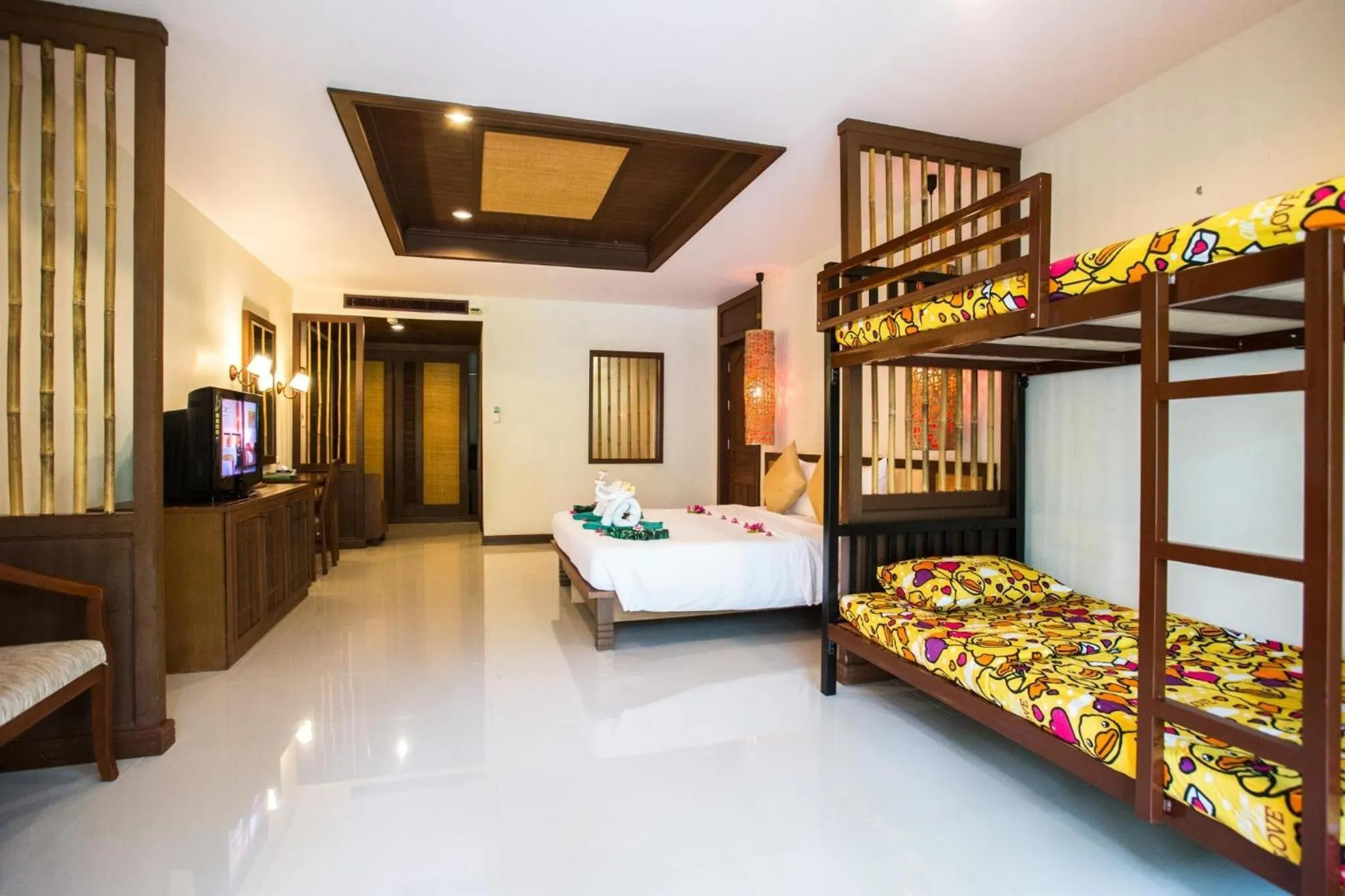 Bed in Hotel and Beach Bungalow at Lanta Resort