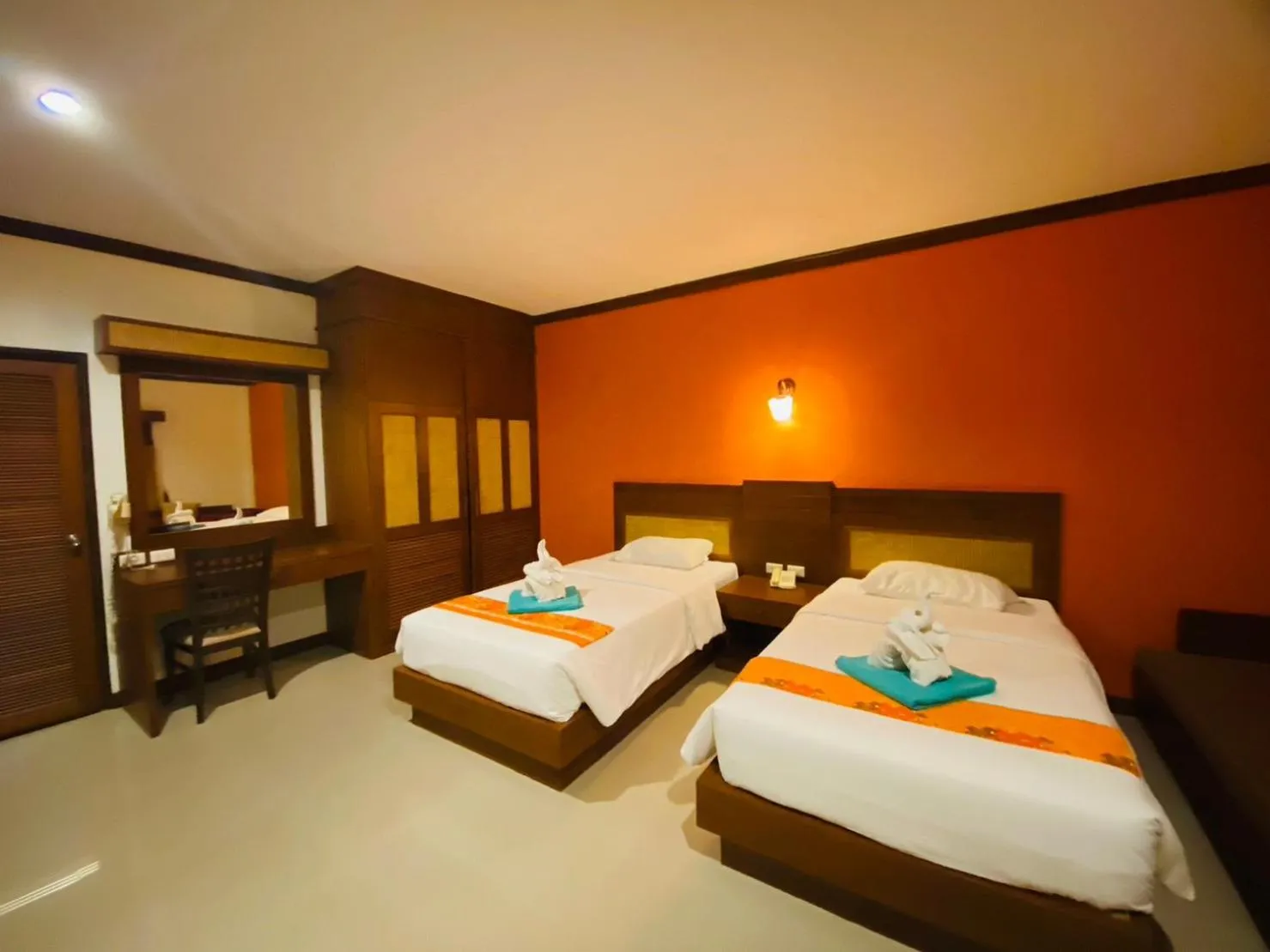 Bed in Hotel and Beach Bungalow at Lanta Resort