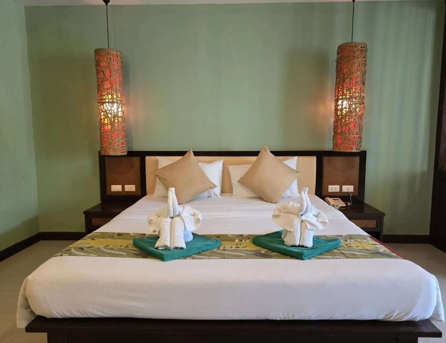 Bed in Hotel and Beach Bungalow at Lanta Resort