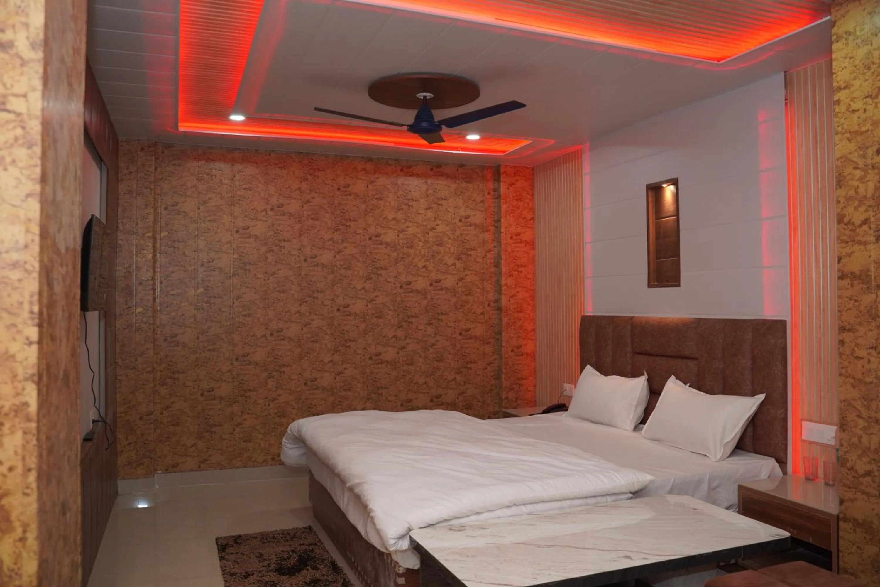 Bed in JB Hotel and Resort