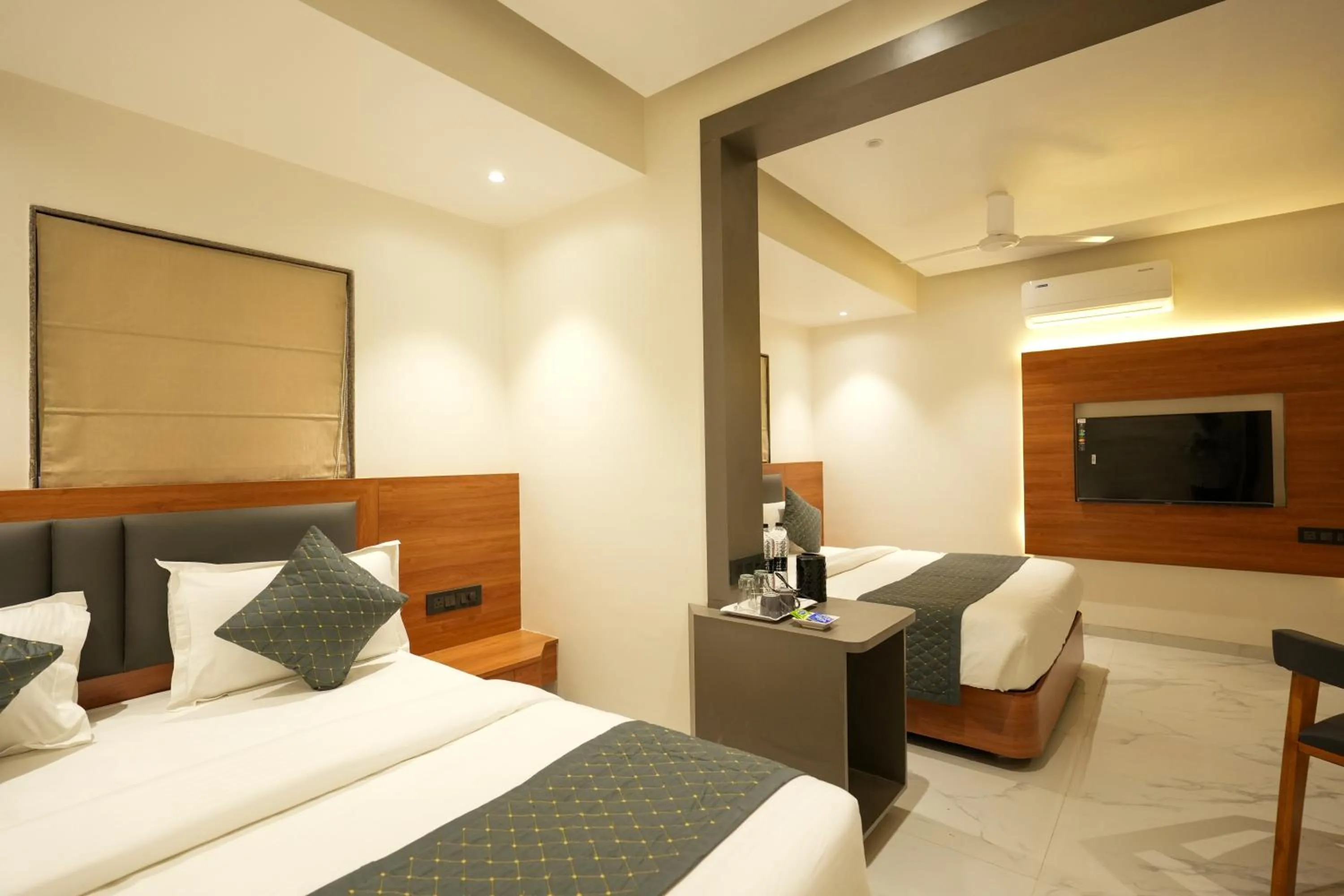 Communal lounge/ TV room, Bed in Hotel Sai Kamal