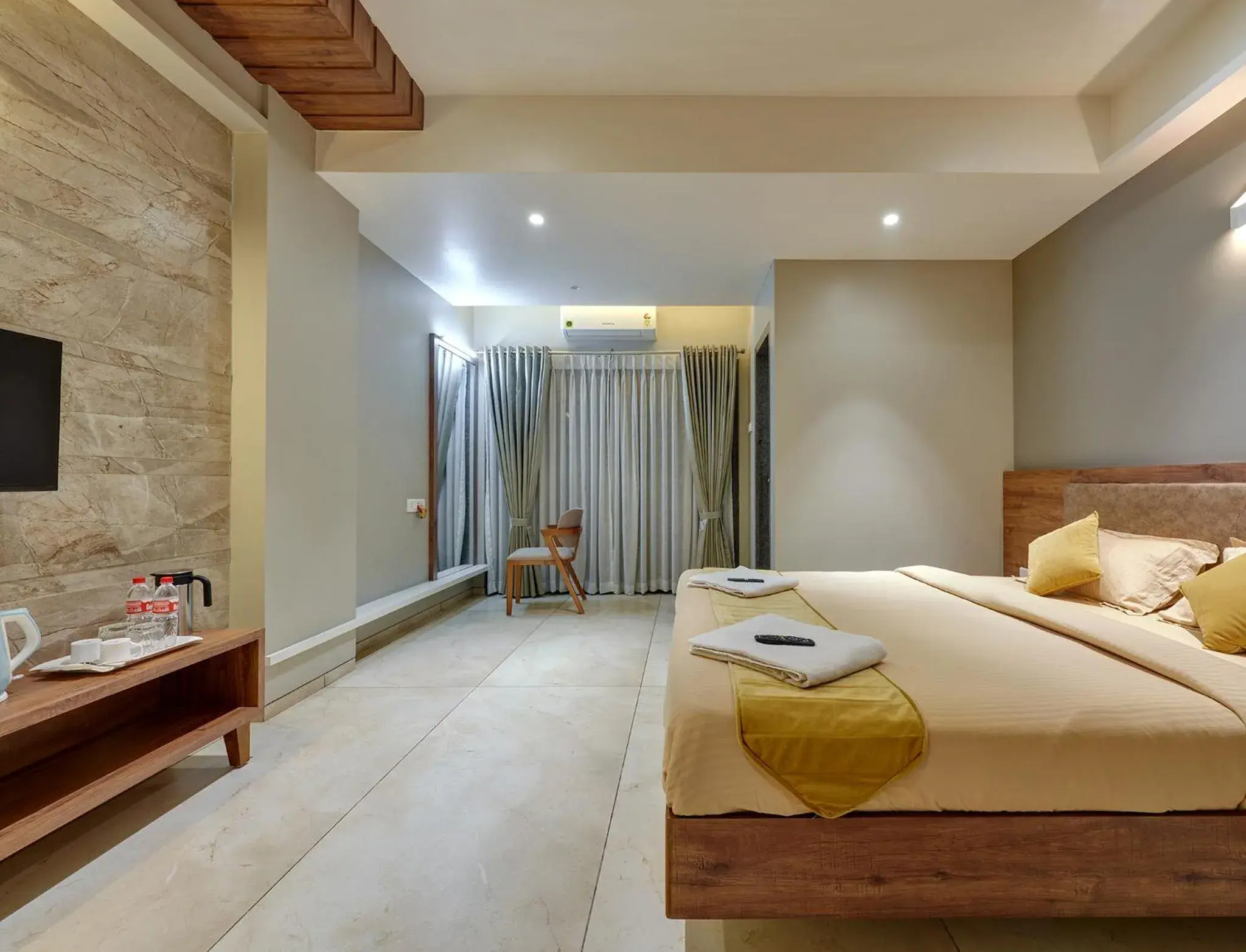 Photo of the whole room, Bed in Hotel Swamini Kolhapur Photo of the whole room, Bed in Hotel Swamini Kolhapur