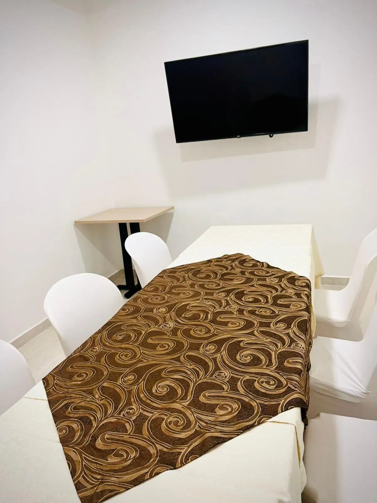 Communal lounge/ TV room in Hotel Luxor Cúcuta