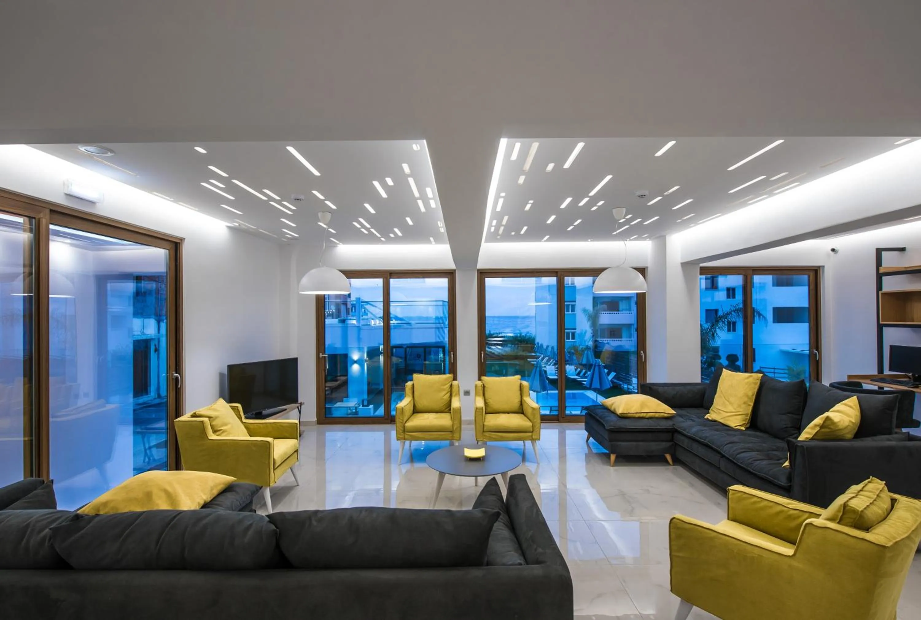 Communal lounge/ TV room in Harma Boutique Hotel