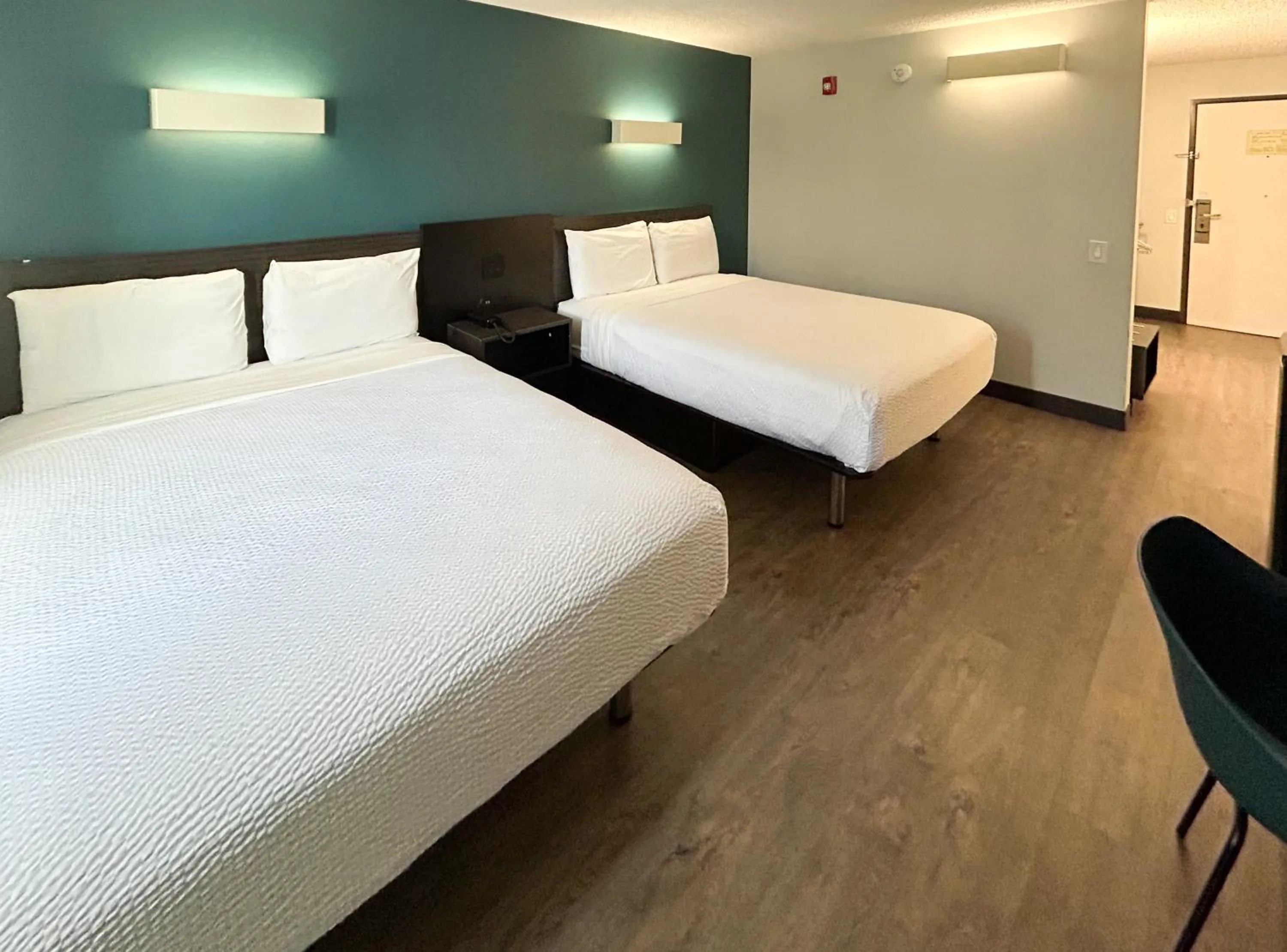 Bedroom, Bed in Studio 6 Suites Carson, CA