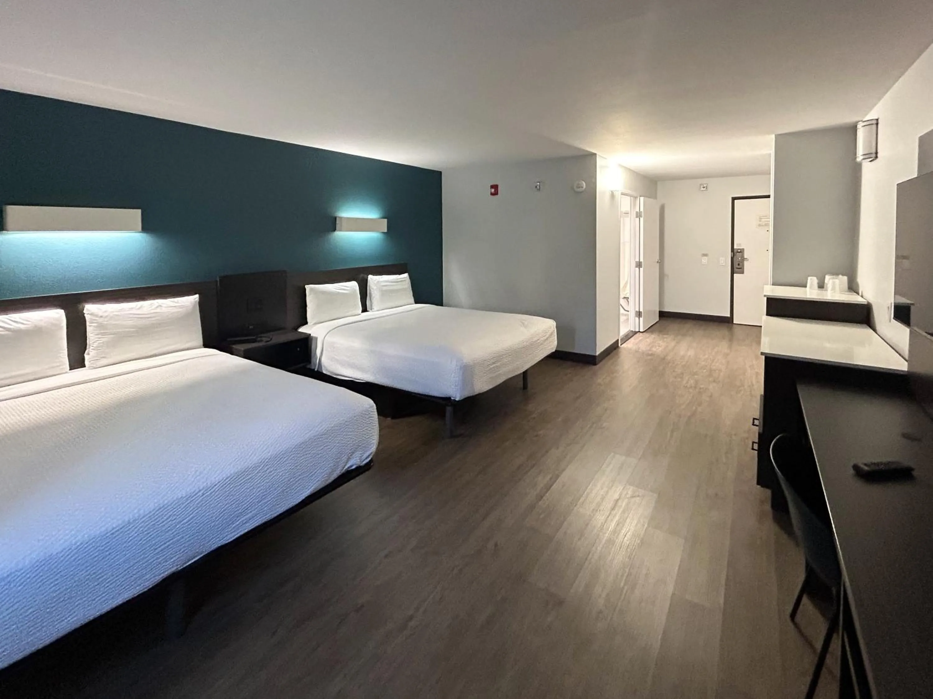 Bedroom, Bed in Studio 6 Suites Carson, CA