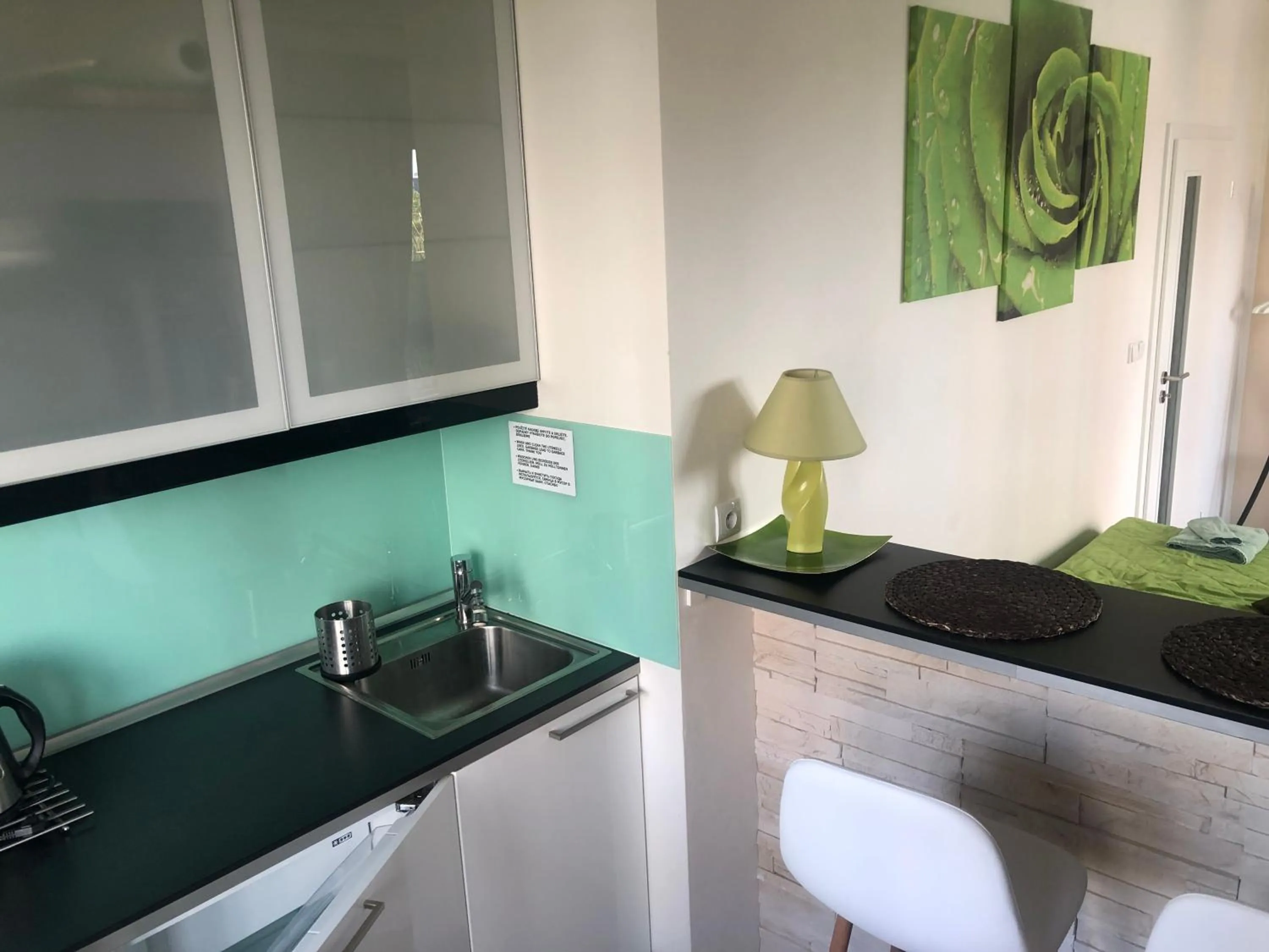 Kitchen or kitchenette in Bastien Studio near Airport