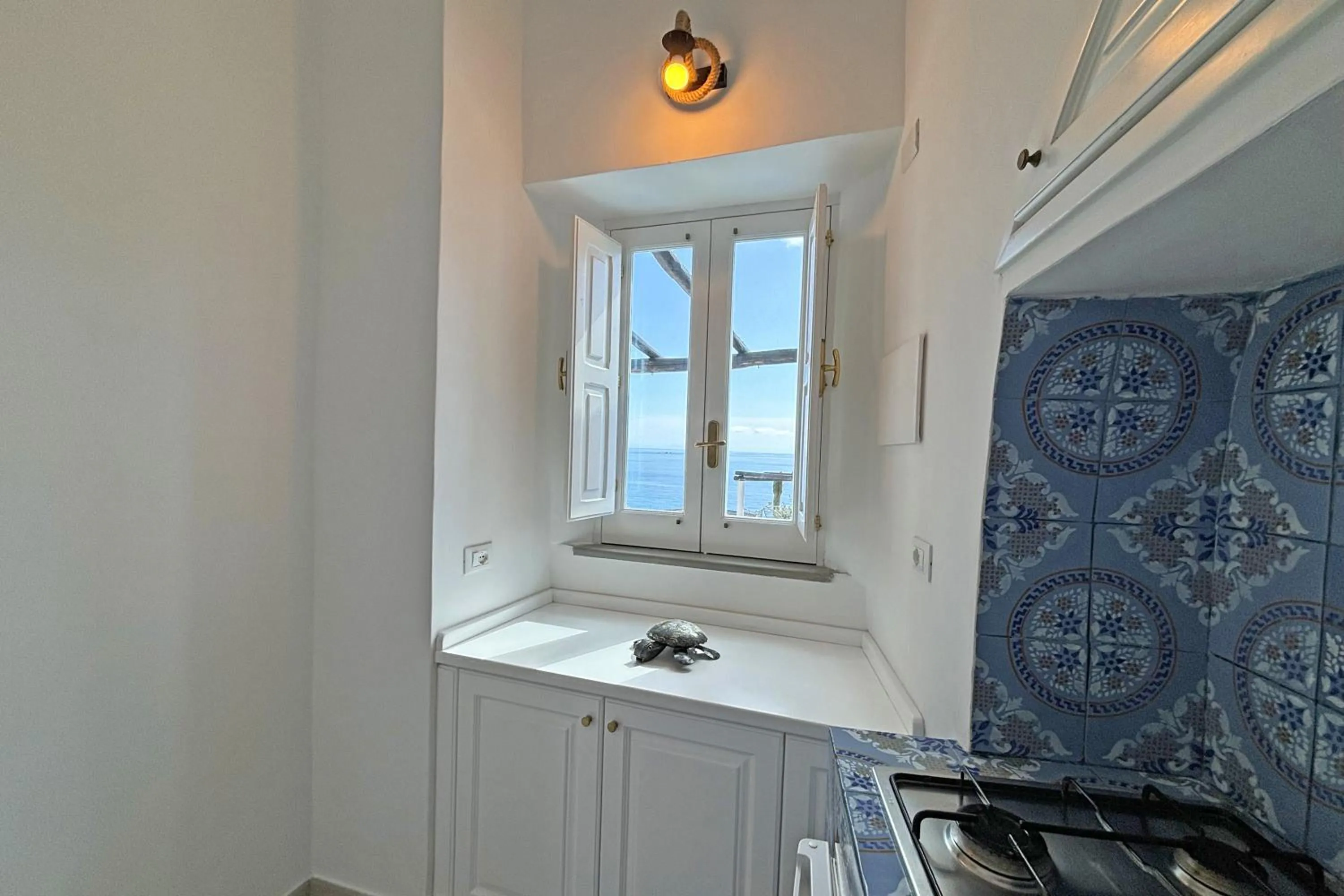 Kitchen or kitchenette in Casa Acquamarina