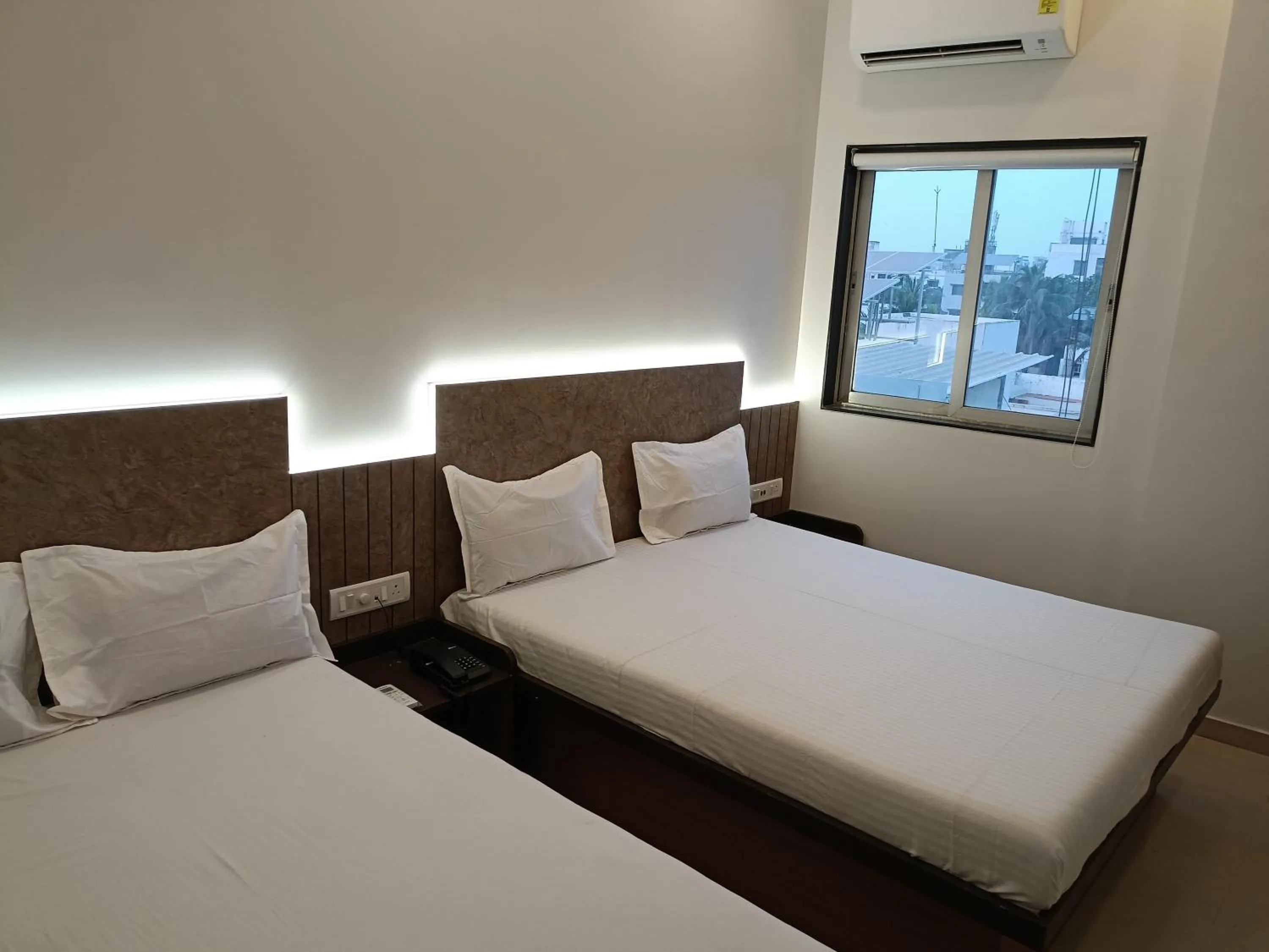 Bed in Hotel Ritz Vesu - Hotels in Vesu, Surat