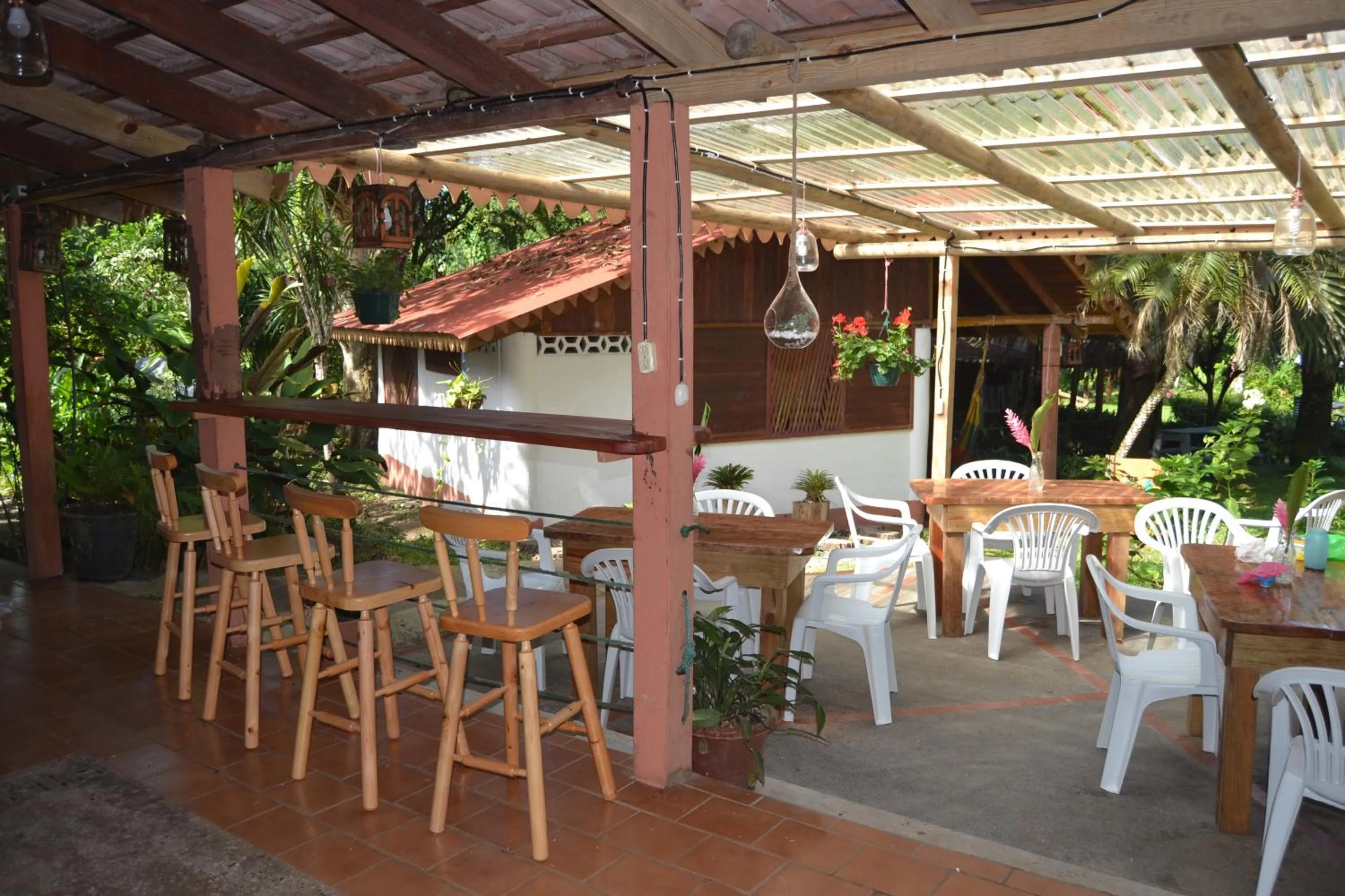 Communal lounge/ TV room in Chalet Y Cabinas Hibiscus