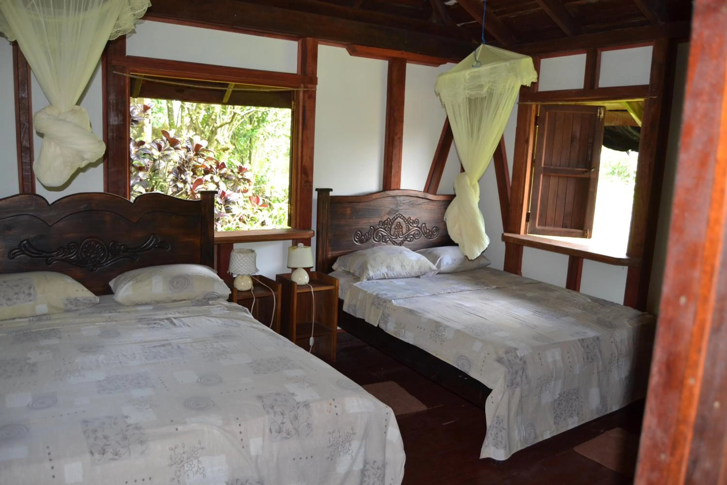 Bed in Chalet Y Cabinas Hibiscus